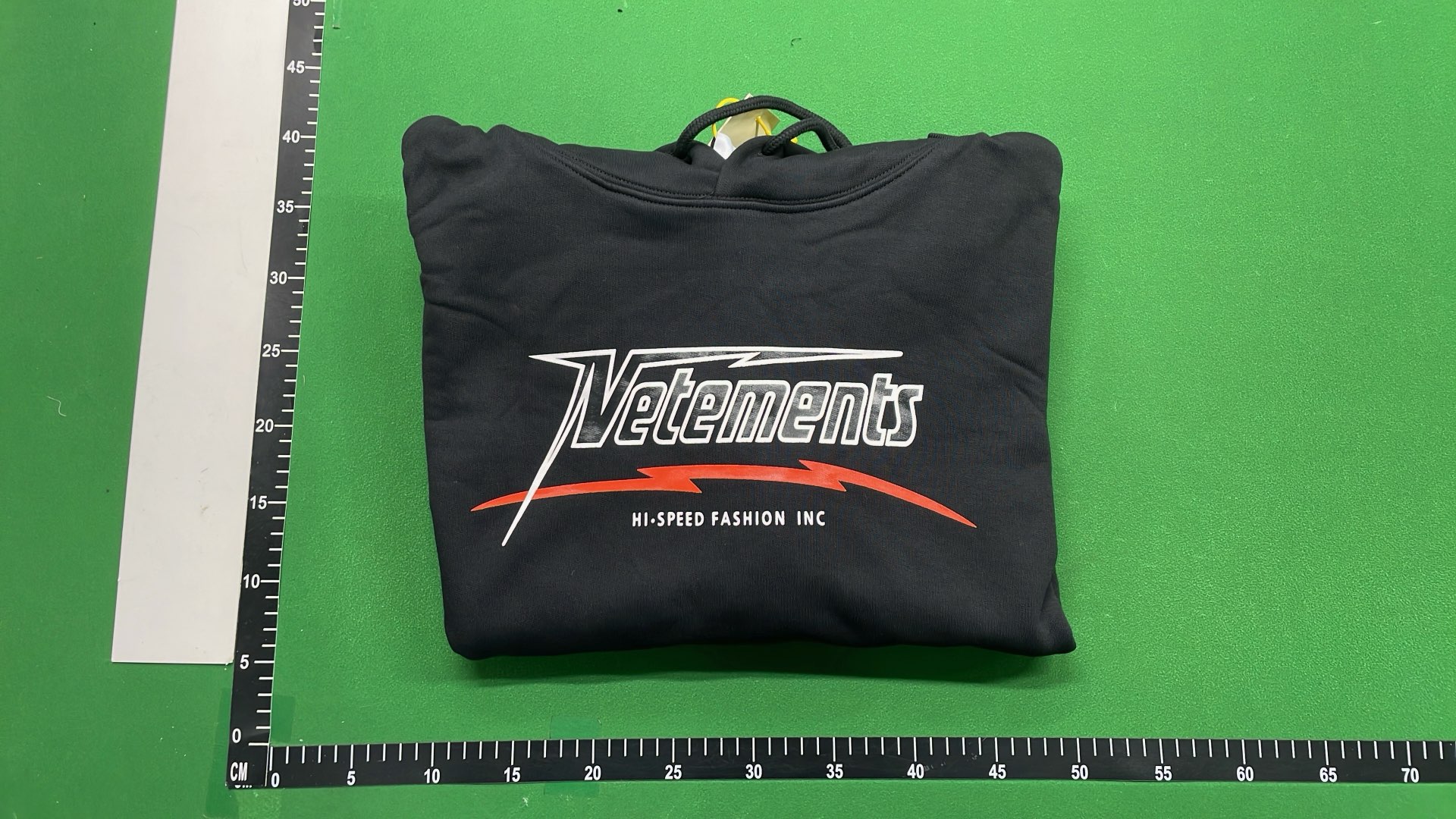 Black Hoodie with Subtle Pattern Design