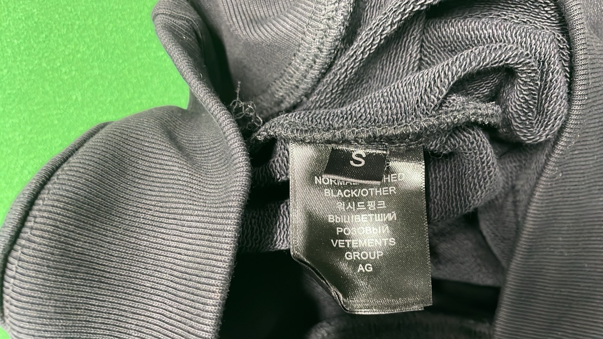 Black Hoodie with Subtle Pattern Design