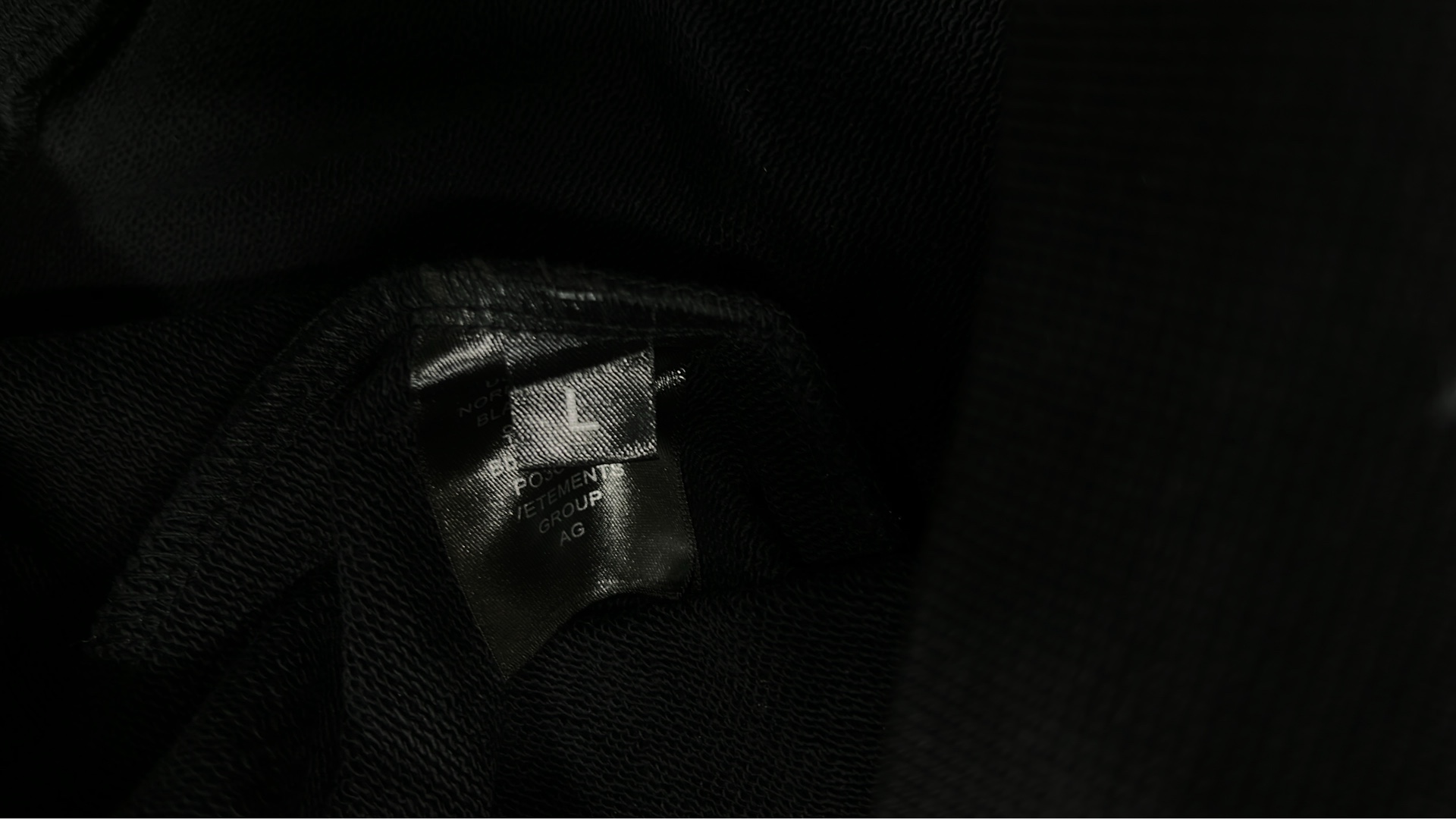 Black Hoodie with Subtle Pattern Design