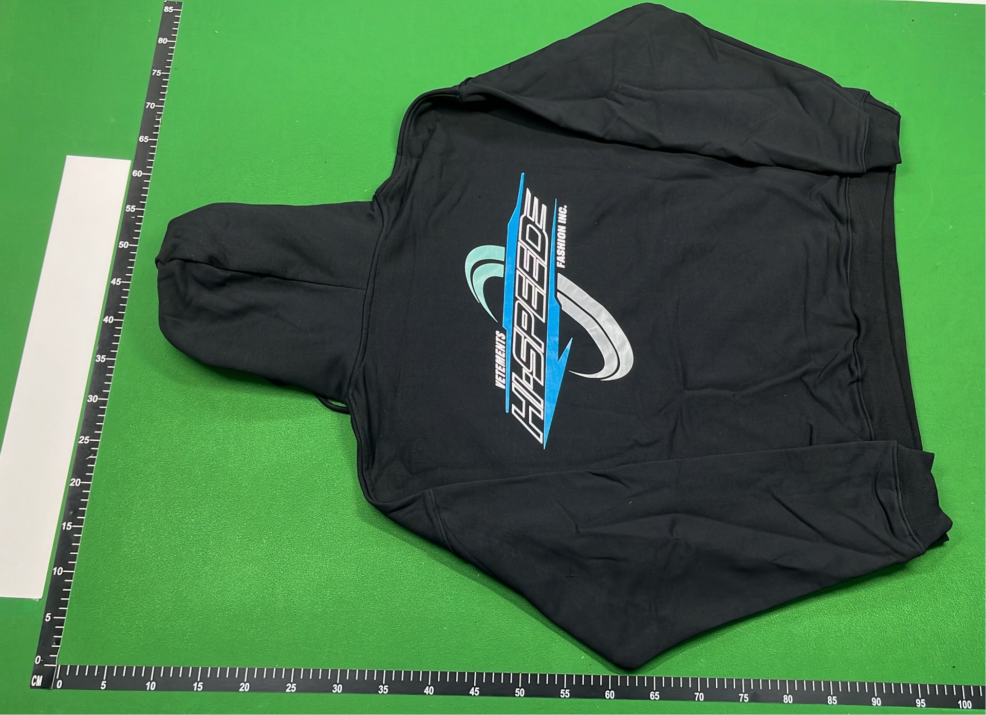 Black Hoodie with Subtle Pattern Design