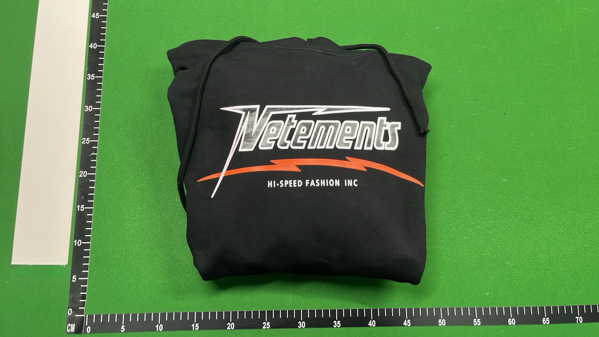 Black Hoodie with Subtle Pattern Design