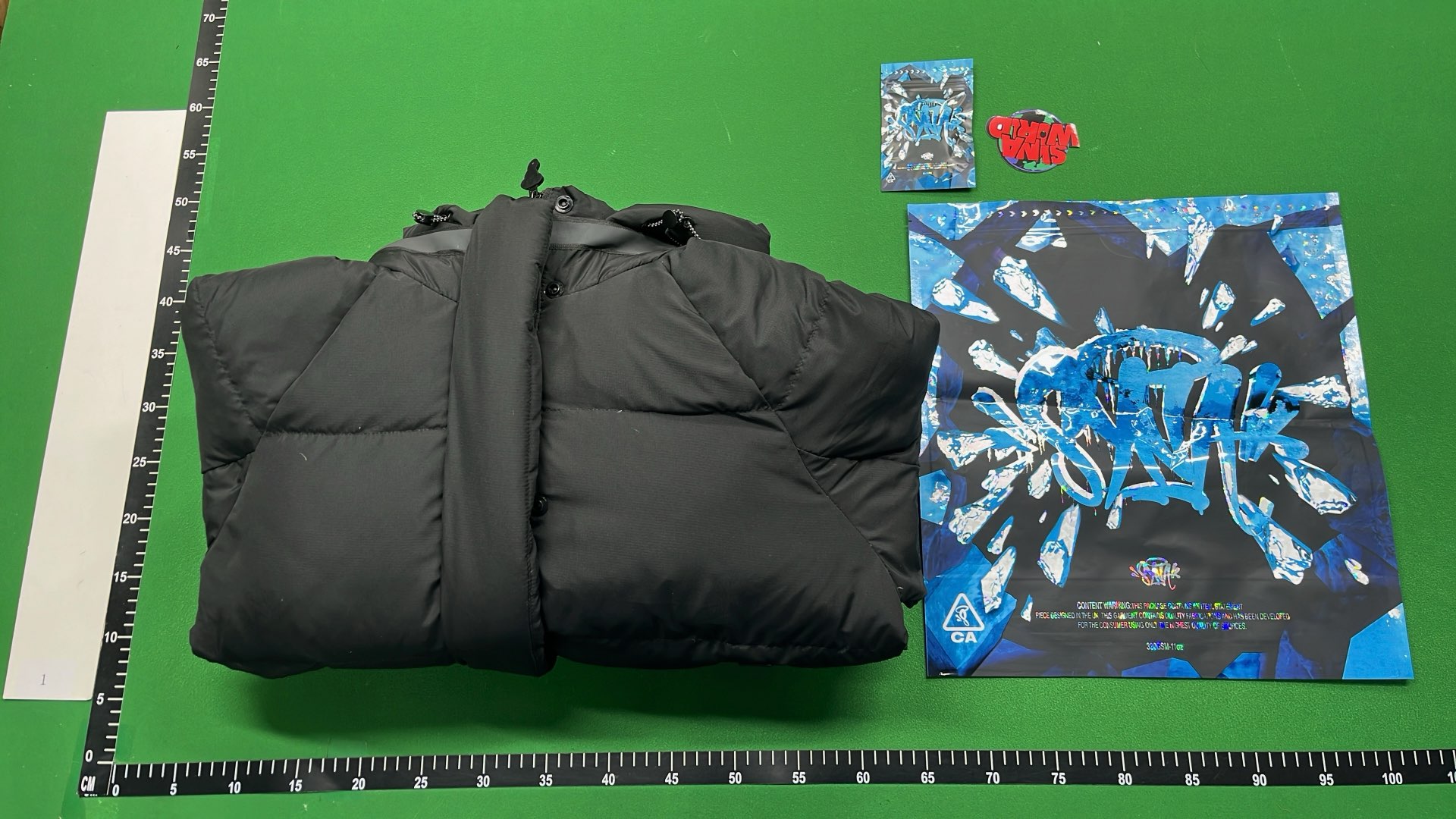 Black Puffer Jacket with Hood and Zippered Pockets