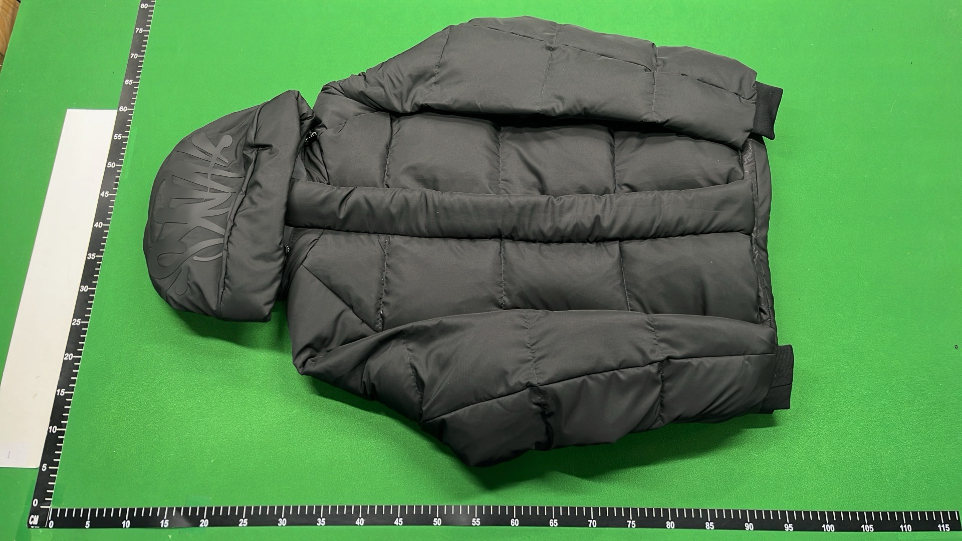 Black Puffer Jacket with Hood and Zippered Pockets
