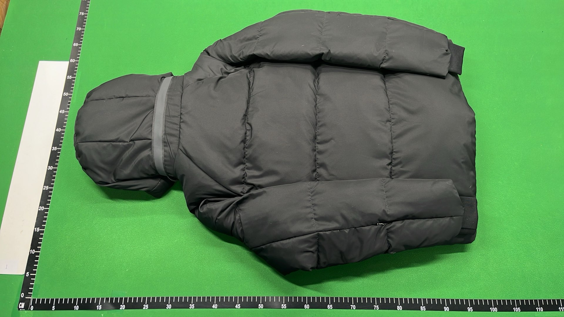 Black Puffer Jacket with Hood and Zippered Pockets