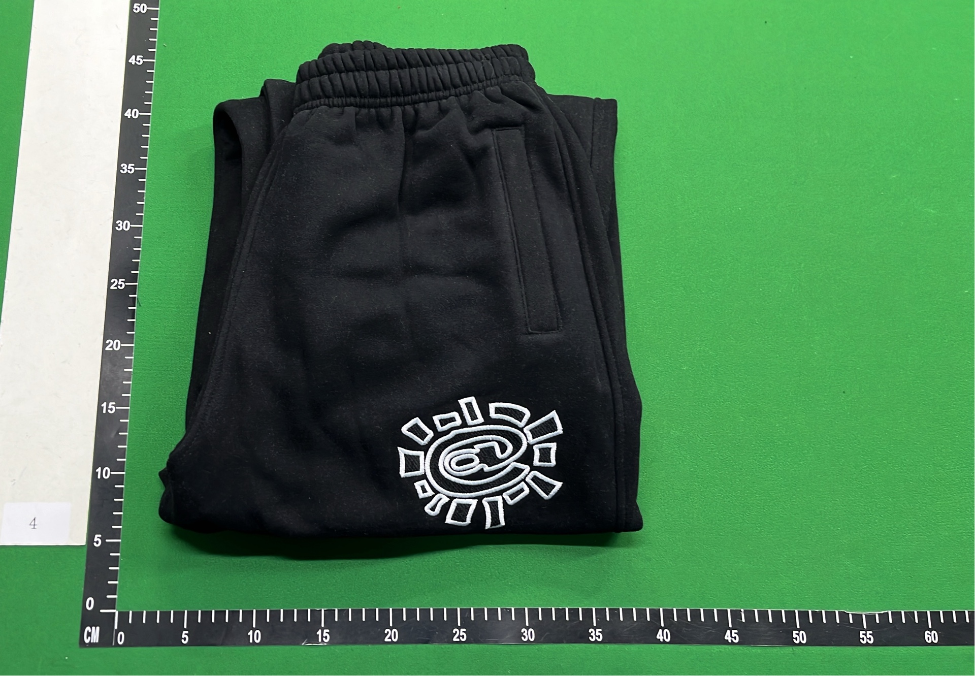 Black Hugo Sweatpants with Unique Logo Design