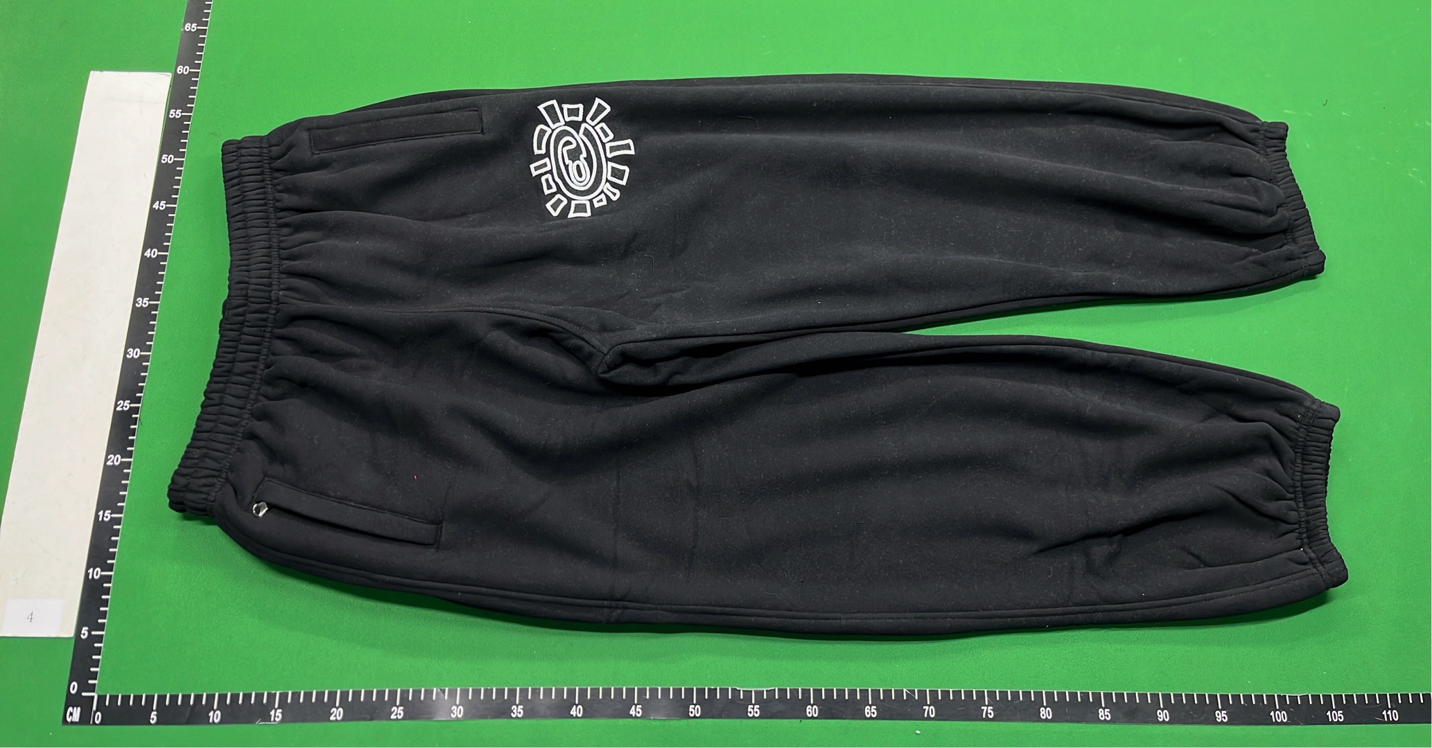Black Hugo Sweatpants with Unique Logo Design
