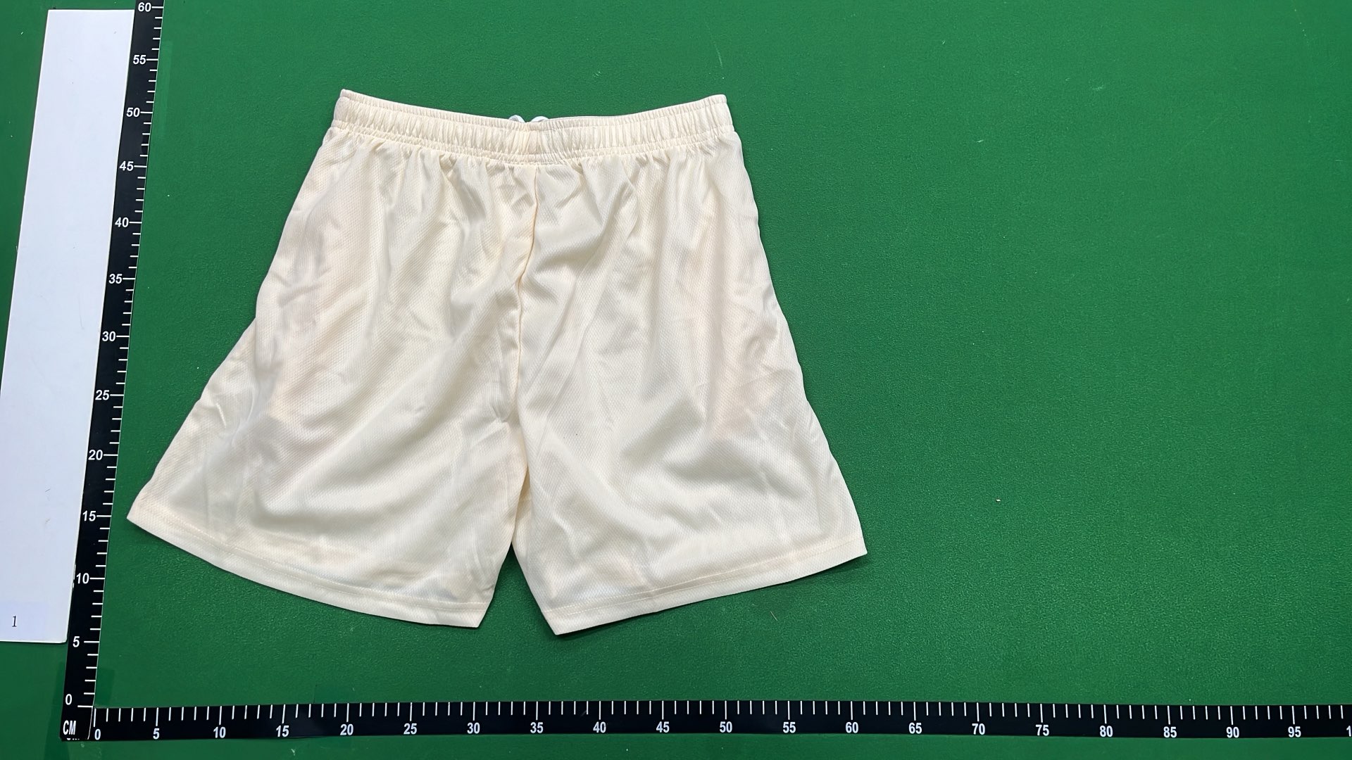 Vibrant Green Mesh Shorts with Logo Design