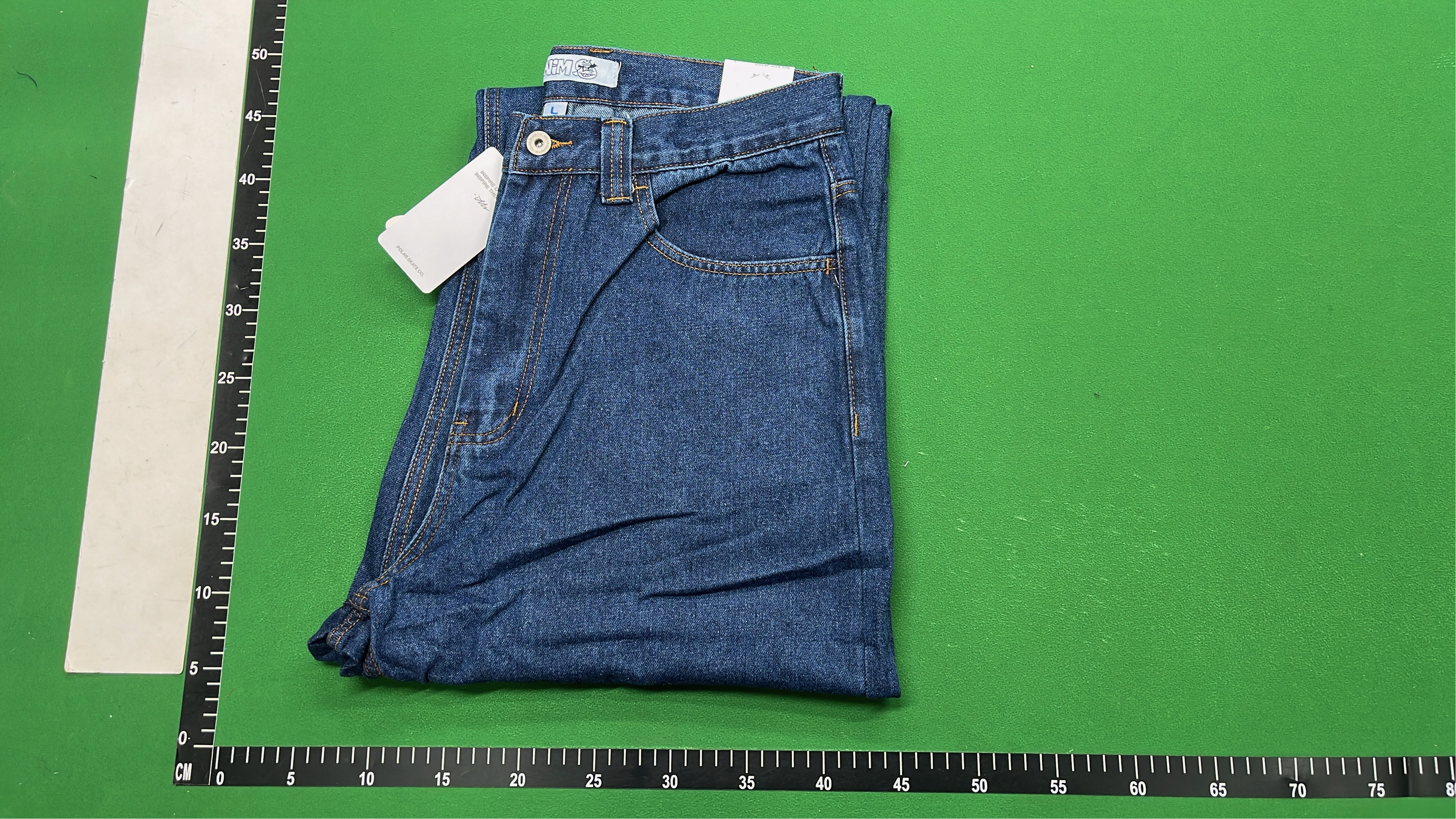 Light Blue Denim Jeans with Embroidered Pocket Detail