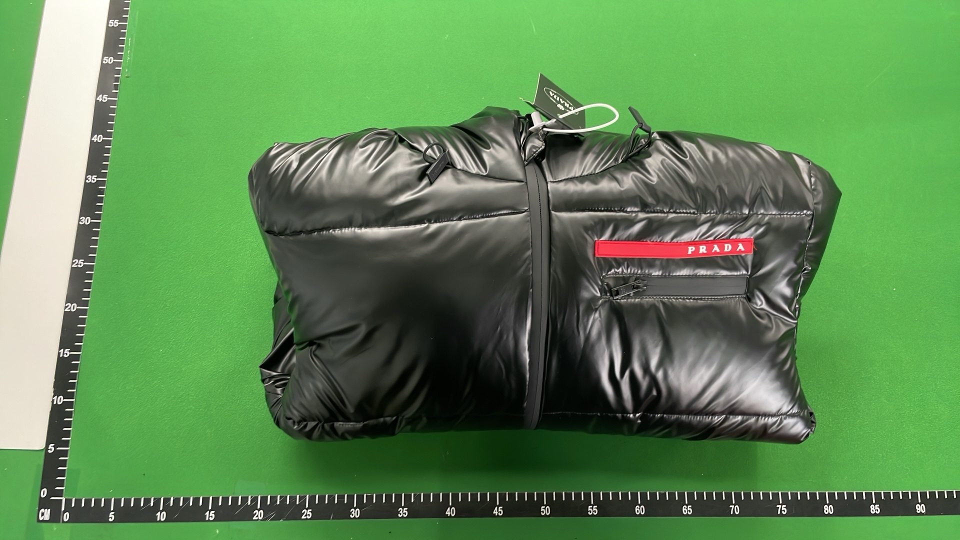 Prada Black Puffer Jacket with Hood and Red Logo