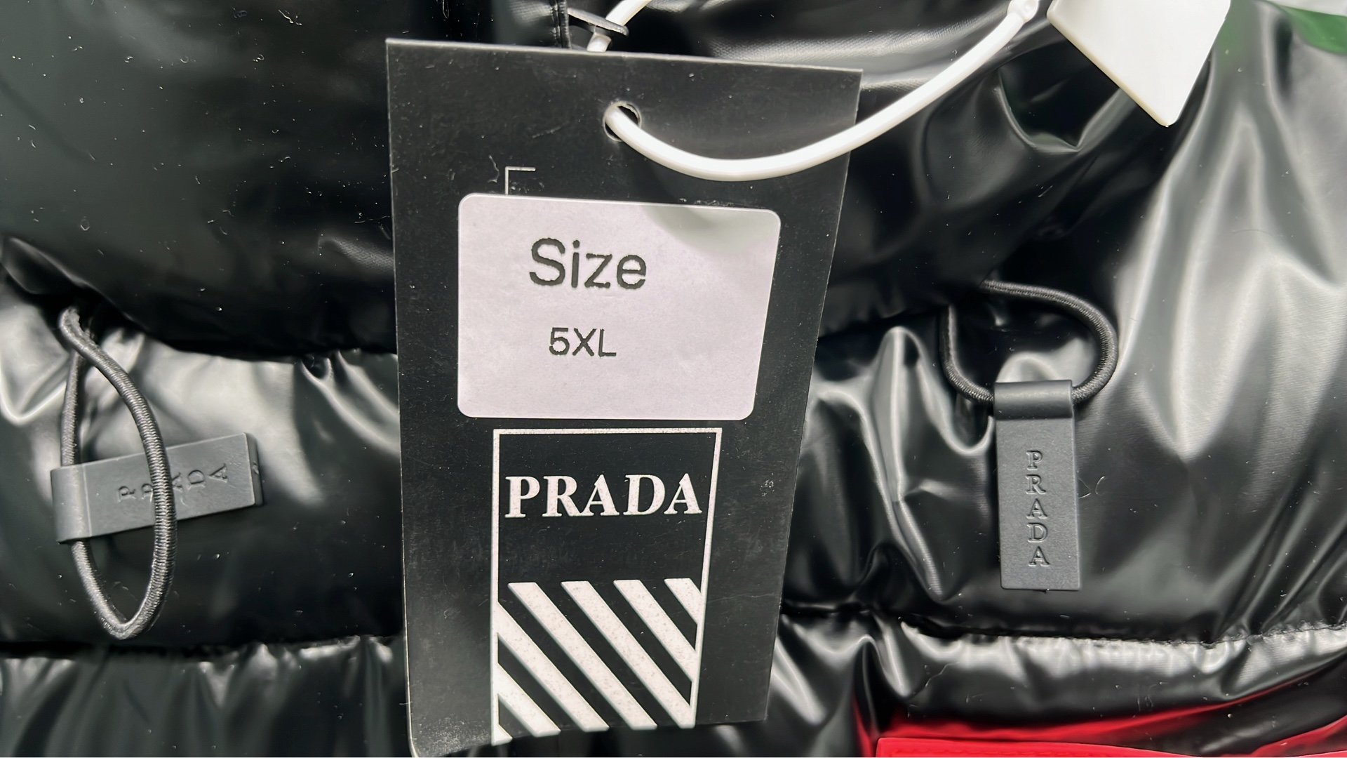 Prada Black Puffer Jacket with Hood and Logo Patch