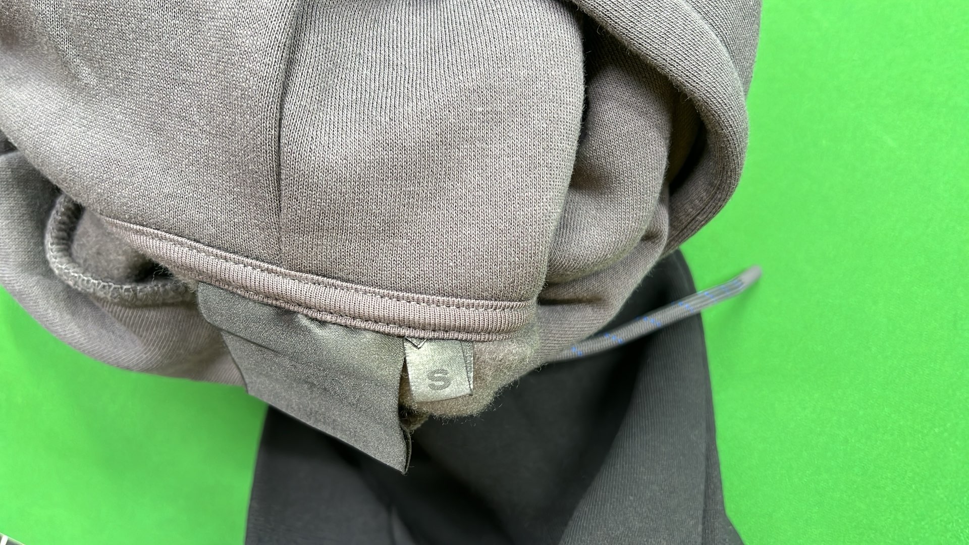 Black and Gray Hoodie with Blue Accents and Logo