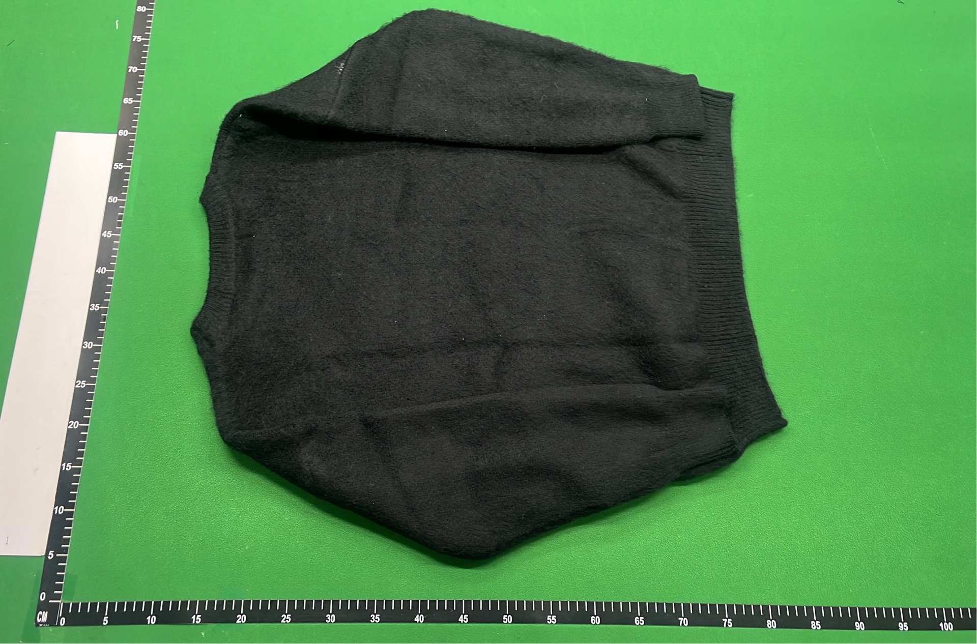 Black Knit Sweater with White Pattern Design