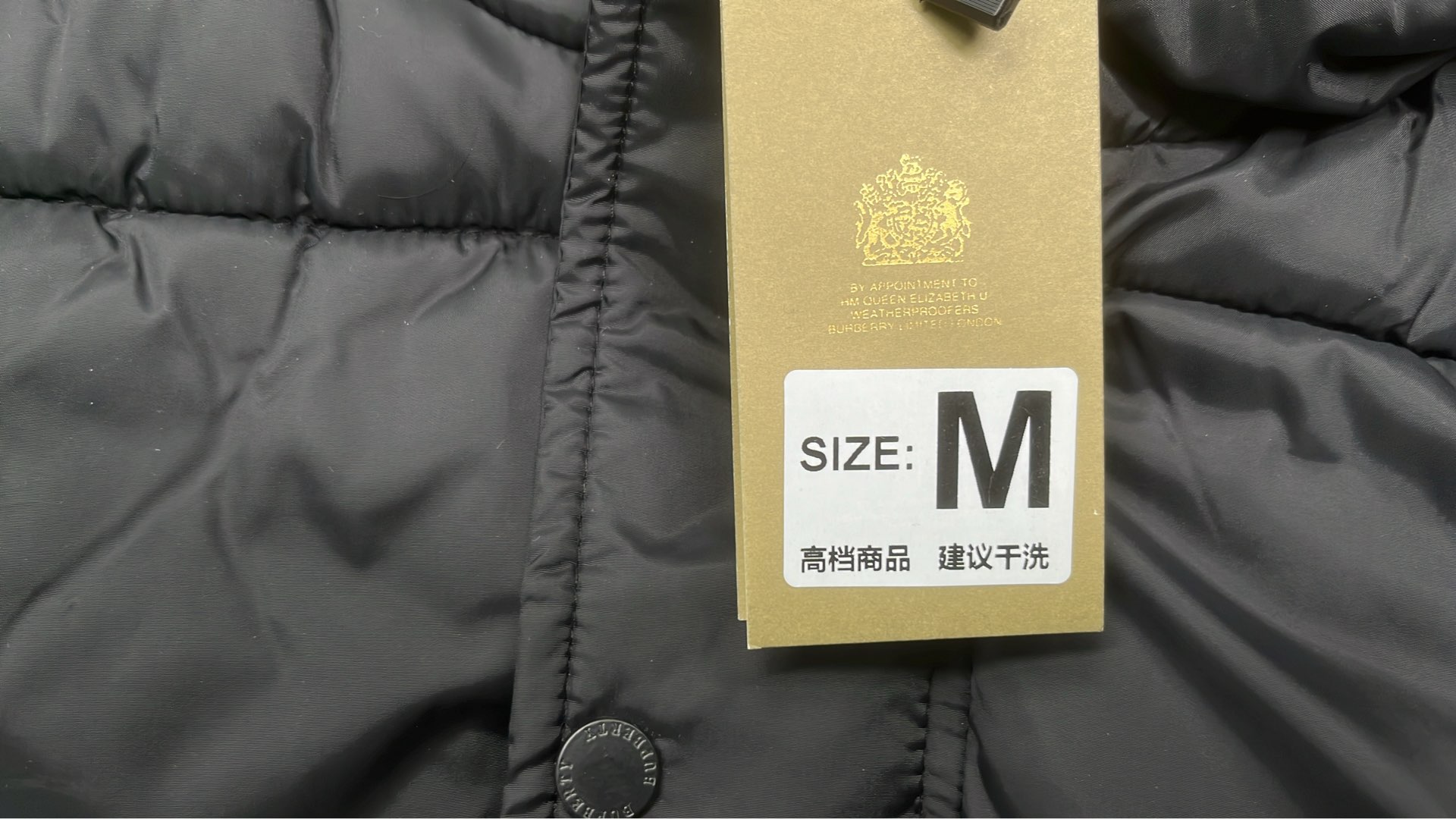 Burberry Black Puffer Jacket with Check Lining and Logo Patch