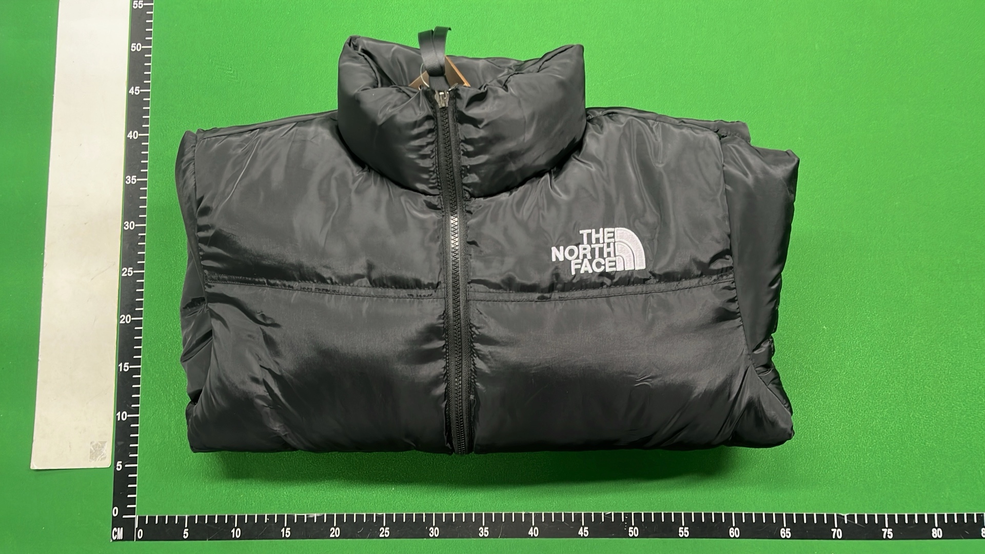 The North Face White Puffer Jacket with Black Hood