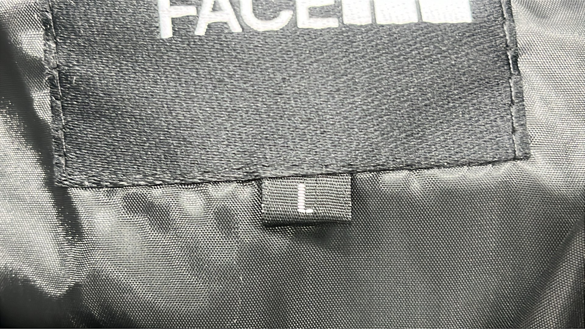 The North Face White Puffer Jacket with Black Hood