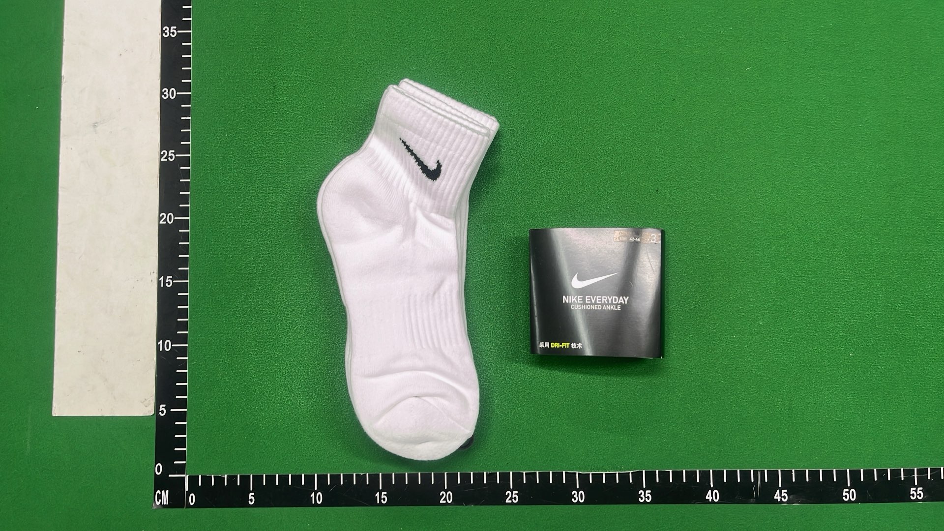 Nike Black Socks with White Swoosh Logo