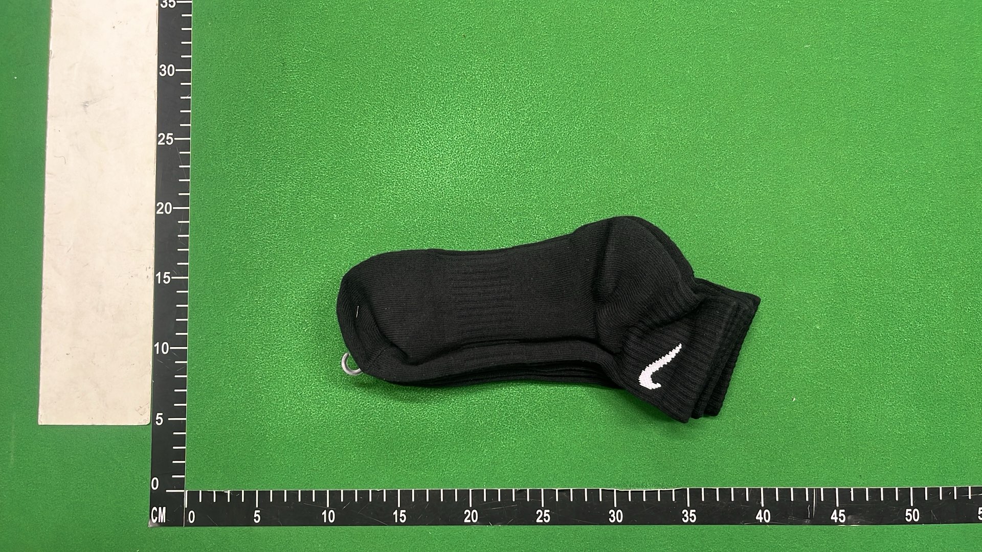 Nike Black Socks with White Swoosh Logo