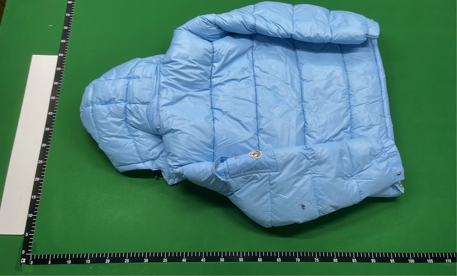 Moncler Black Puffer Jacket with Hood and Red Zip Detail