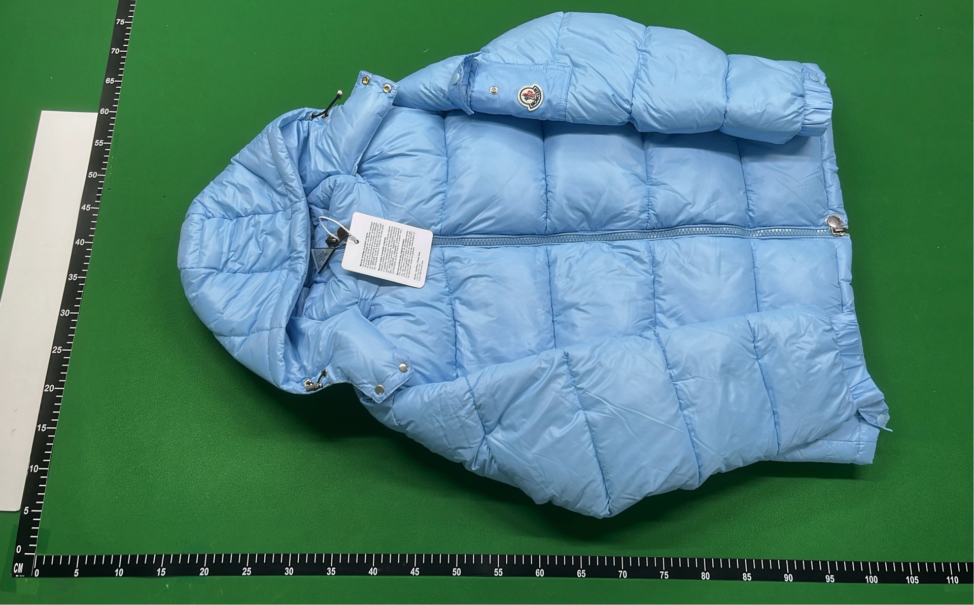 Moncler Black Puffer Jacket with Hood and Red Zip Detail