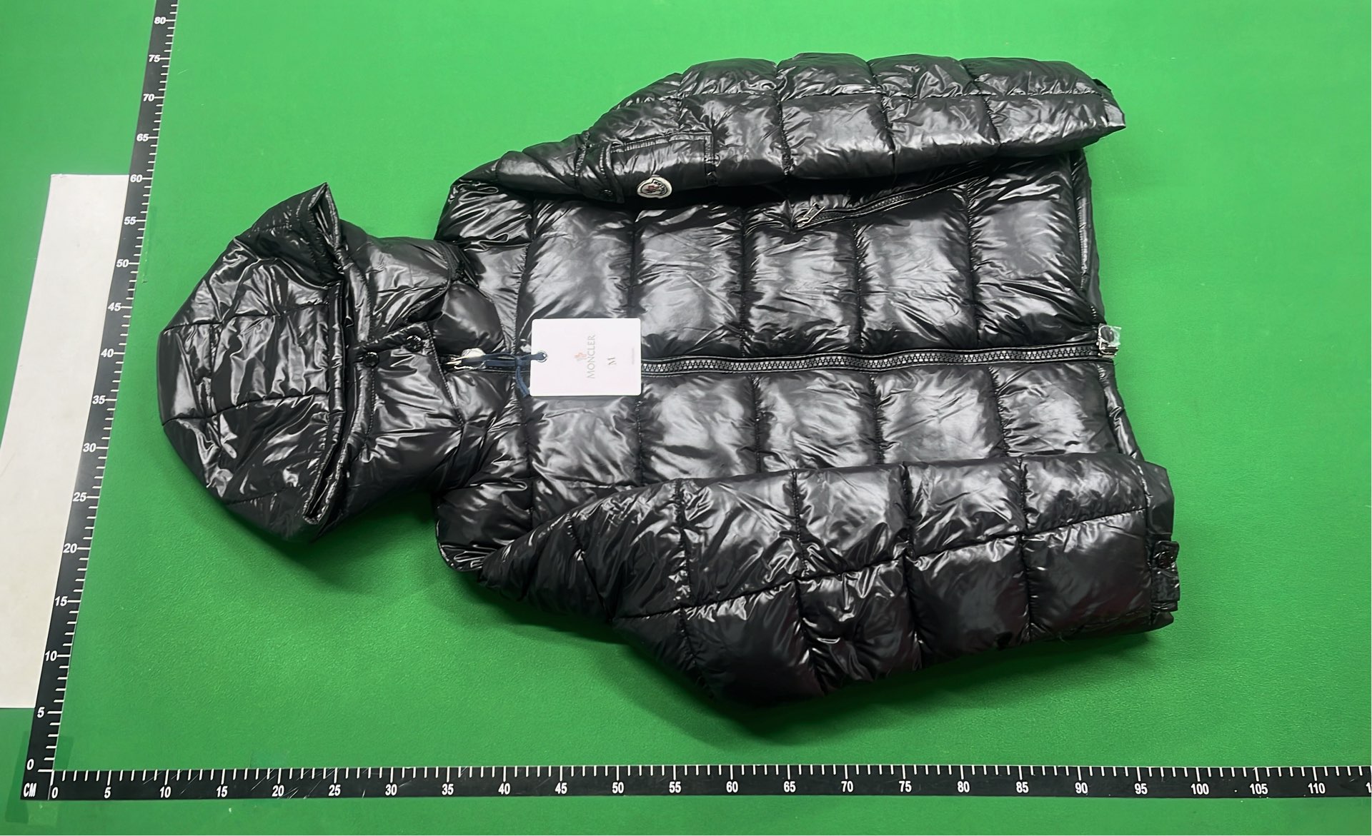 Moncler Black Puffer Jacket with Hood and Red Zip Detail