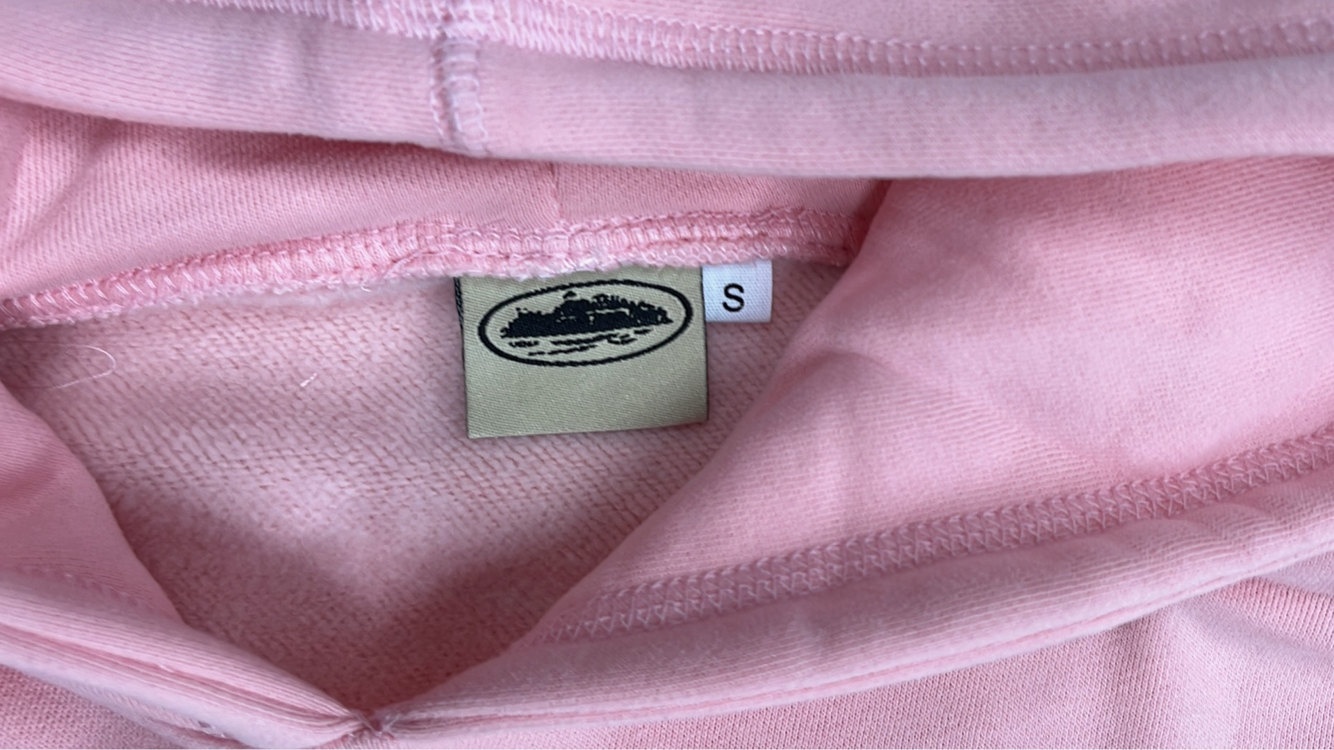 Pink Hoodie with Oval Logo Design
