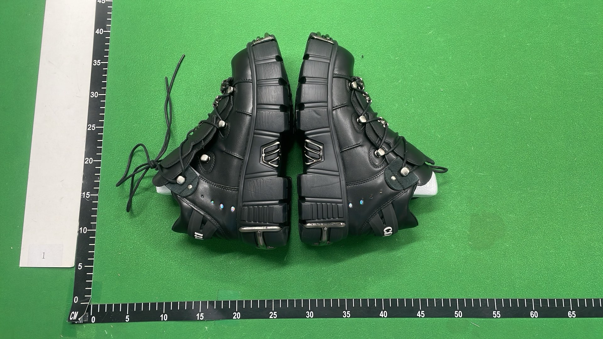 Black Platform Boots with Metal Buckles and Plush Lining