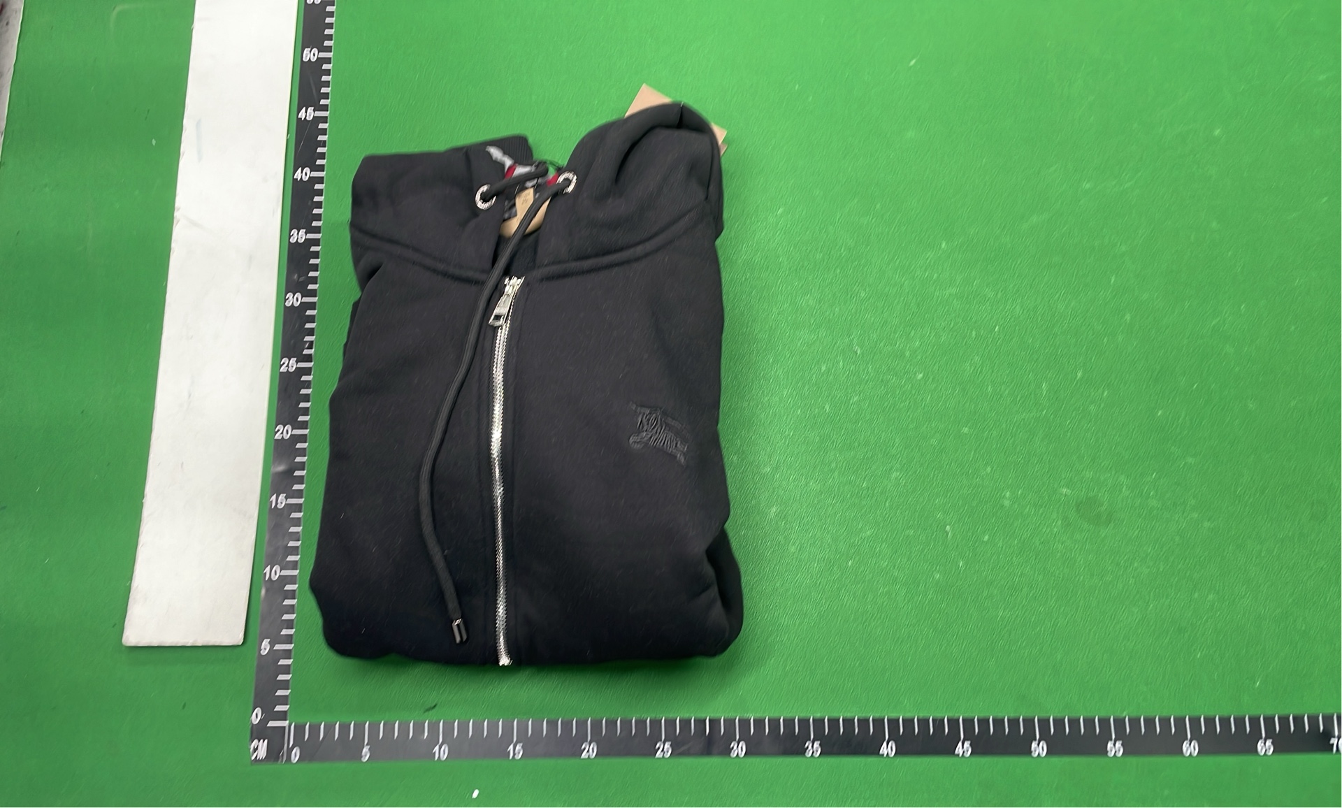 Gray Zip-Up Hoodie with Check Lining and Front Pockets