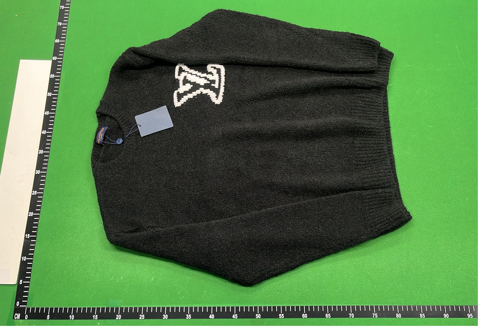 Blue Knit Sweater with Embroidered V Logo