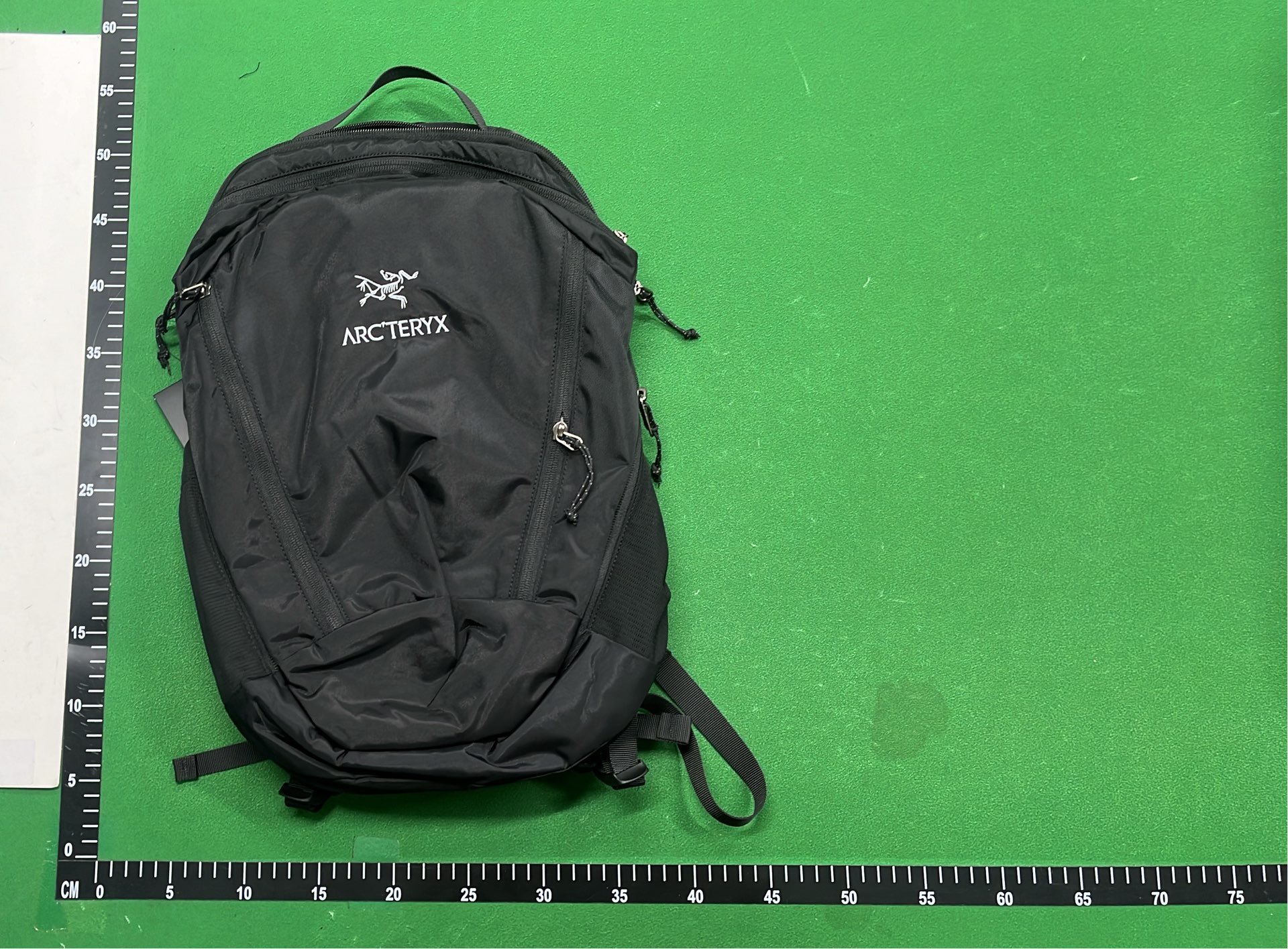 Arc'teryx Black Backpack with Yellow Logo