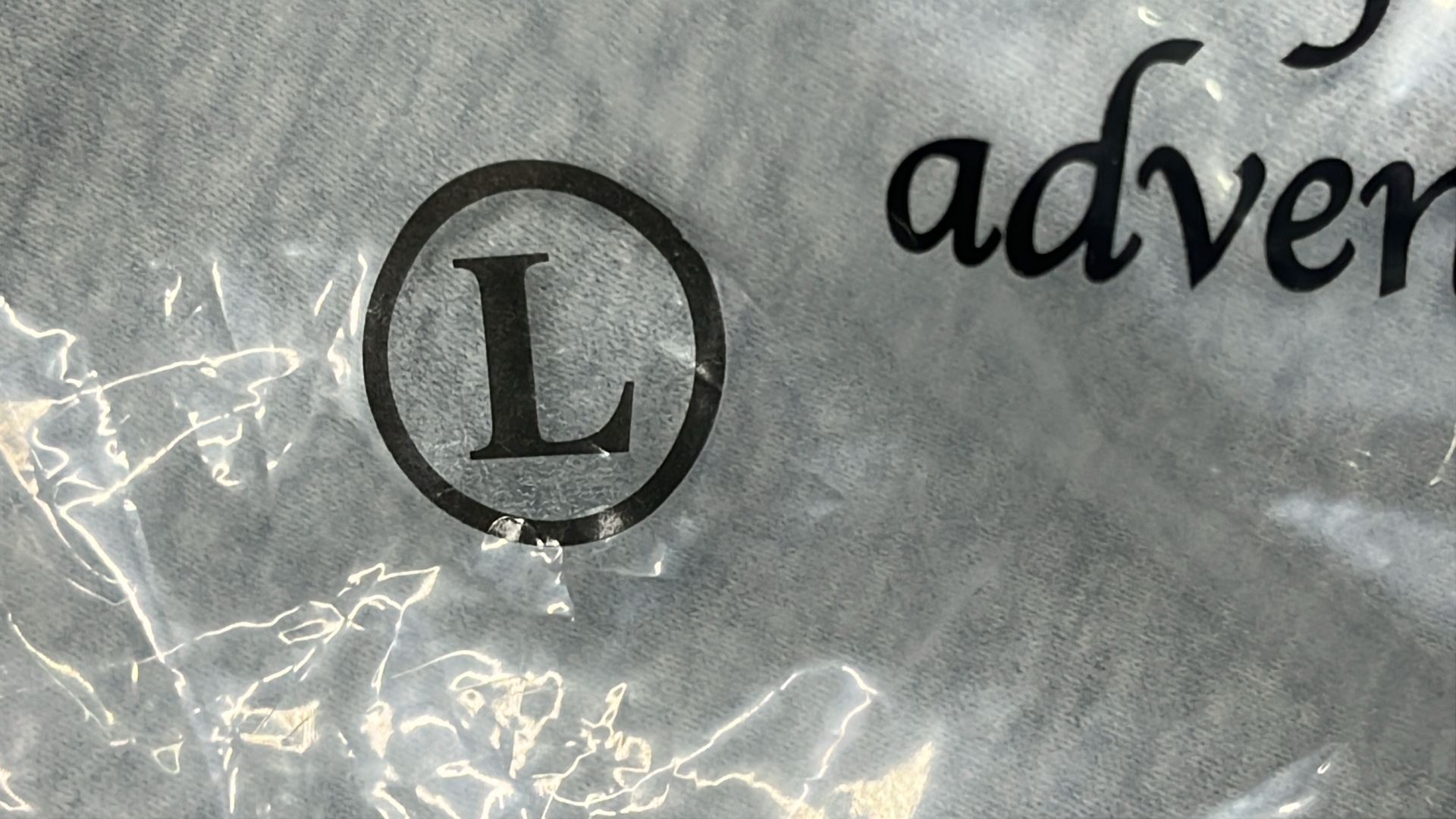 Gray Sweatpants with White Logo Design