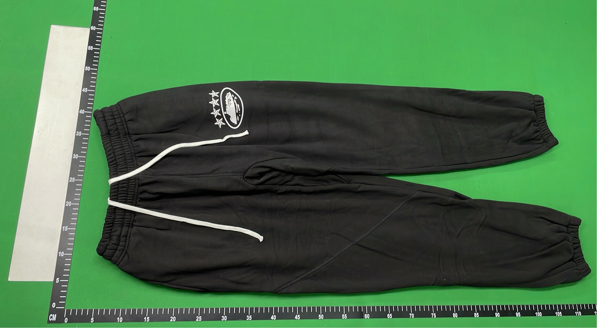 Black Sweatpants with Star Logo Design