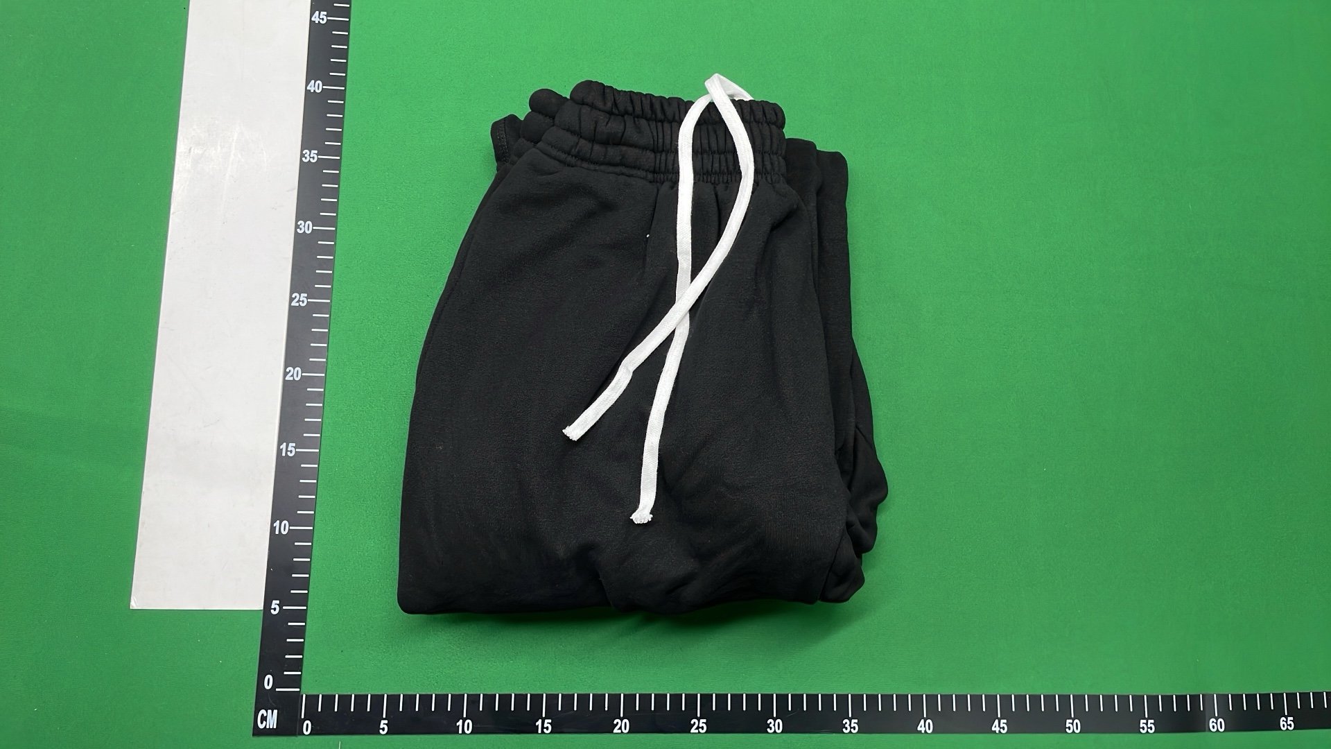 Black Sweatpants with Star Logo Design