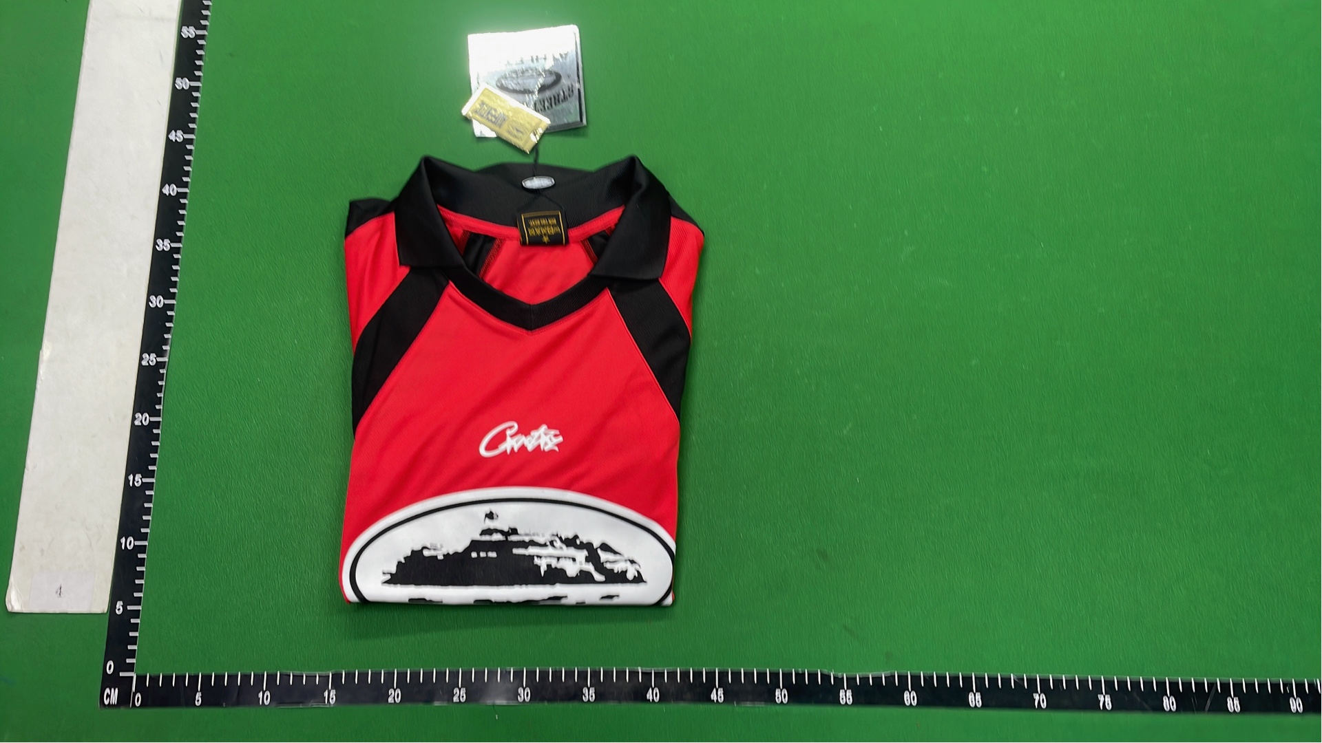 Red and Black Cortez Jersey with 'rulestheworld' Sleeve Design