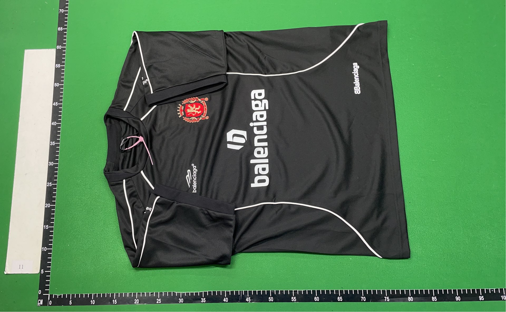 Neon Green Soccer Jersey with Black Accents and Logo