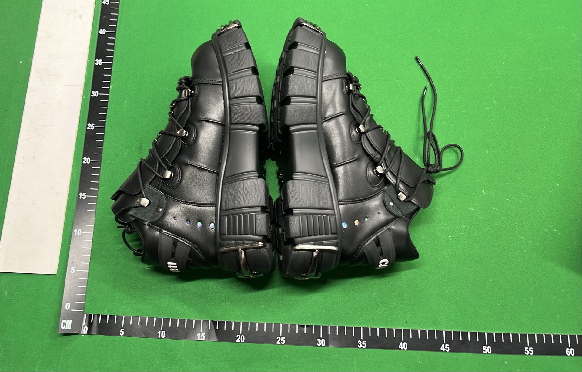 Black Platform Boots with Metal Buckles and Plush Lining