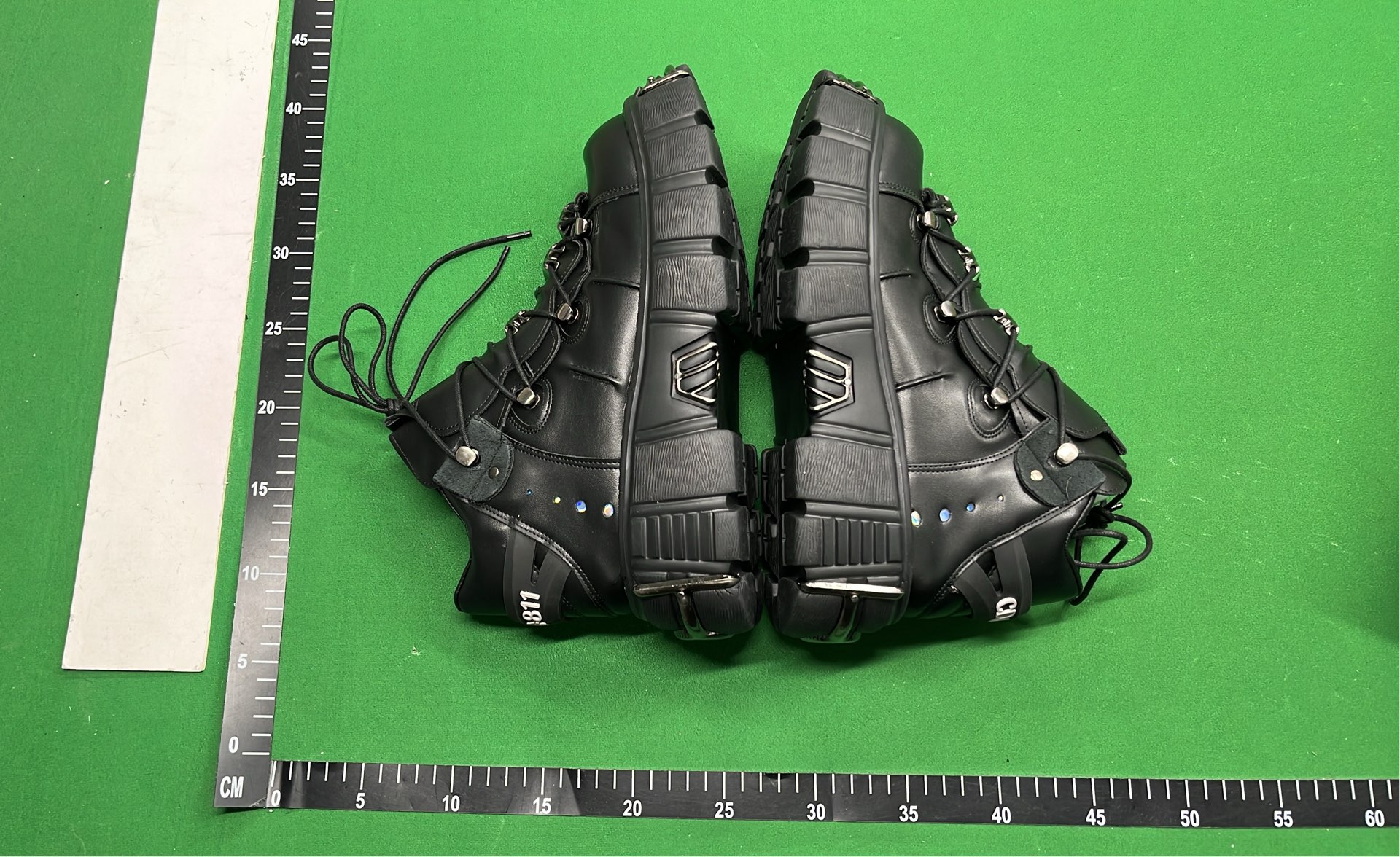 Black Platform Boots with Metal Buckles and Plush Lining