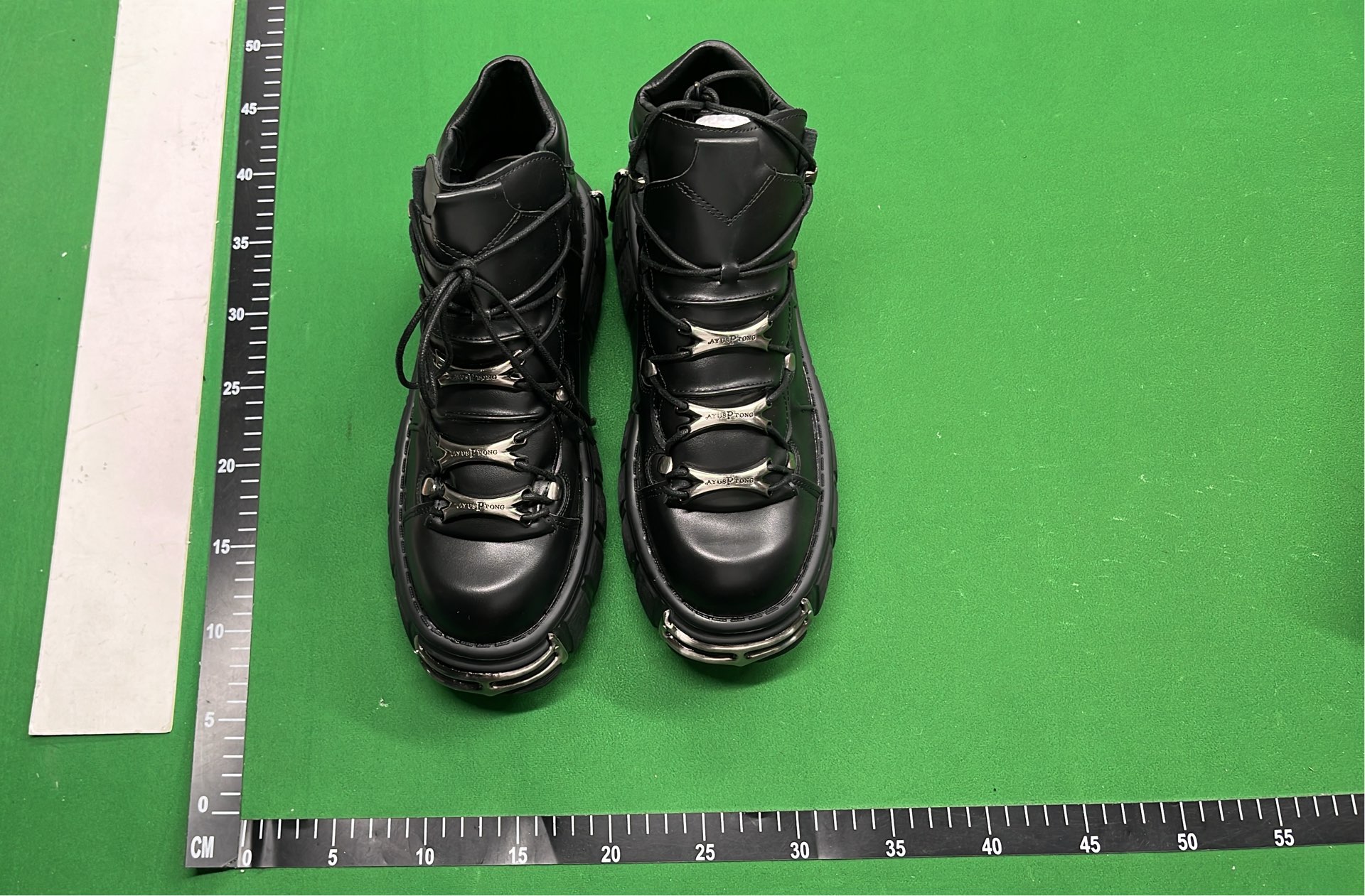 Black Platform Boots with Metal Buckles and Plush Lining
