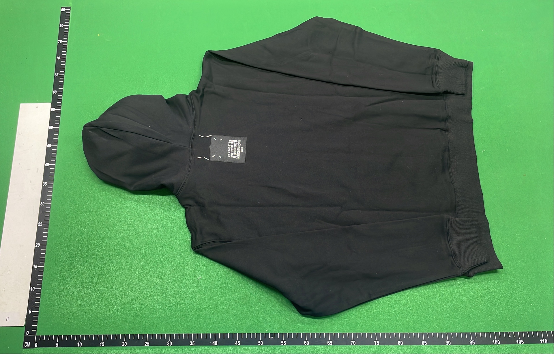 Black Hoodie with Number Pattern Design