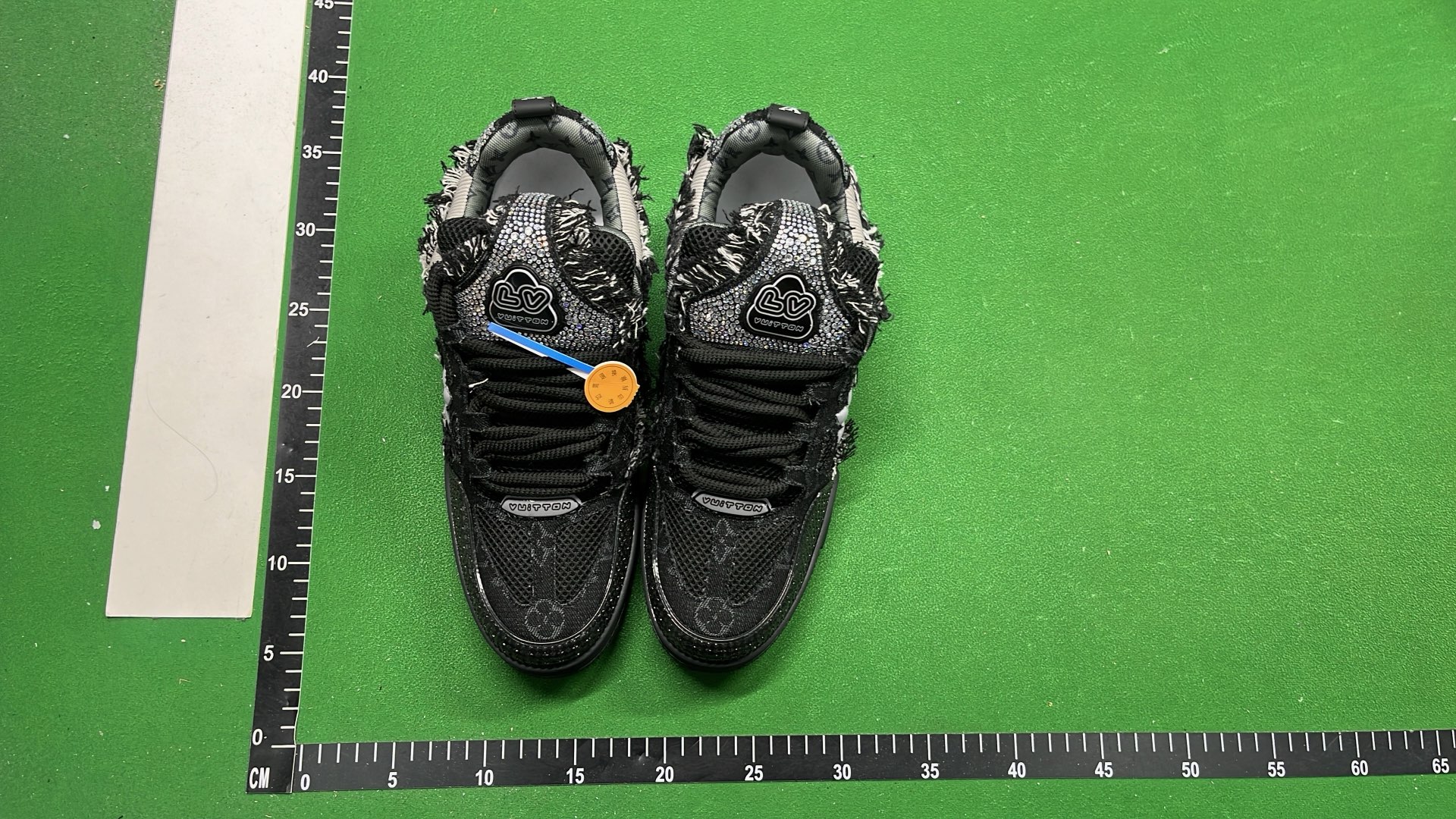 LV Trainer Sneakers in Navy and White