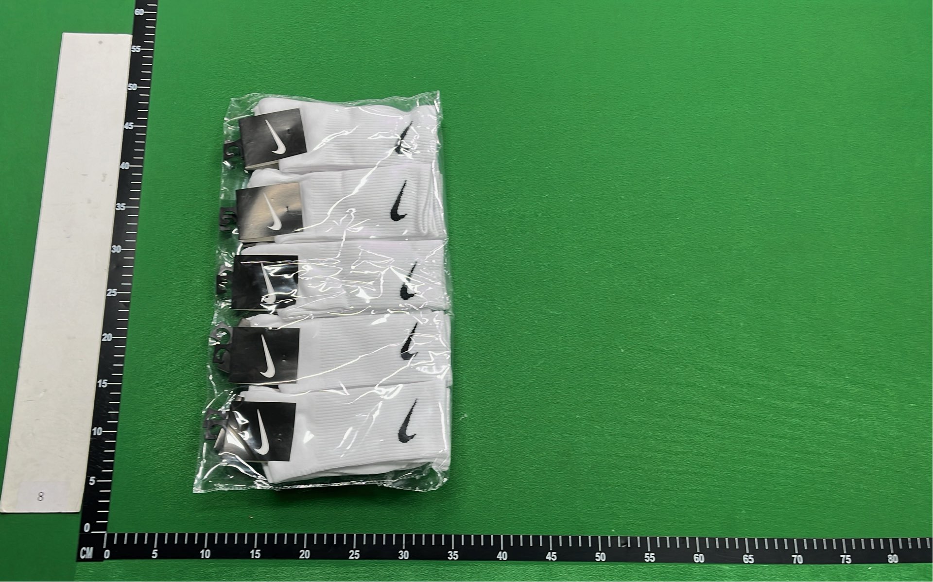 Nike Black Socks with White Swoosh Logo