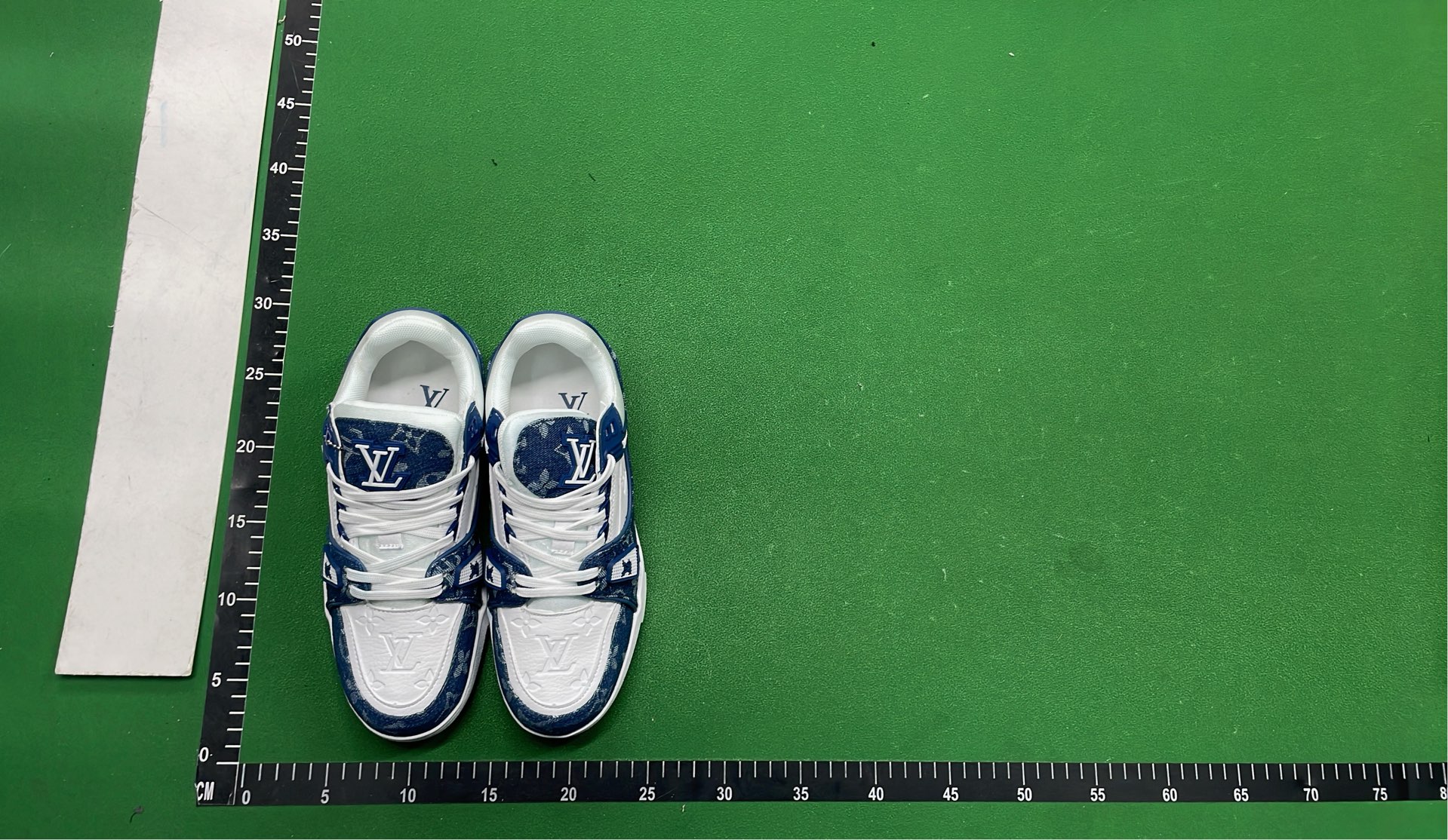 White and Green VUITTON Sneakers with Bold Logo Design