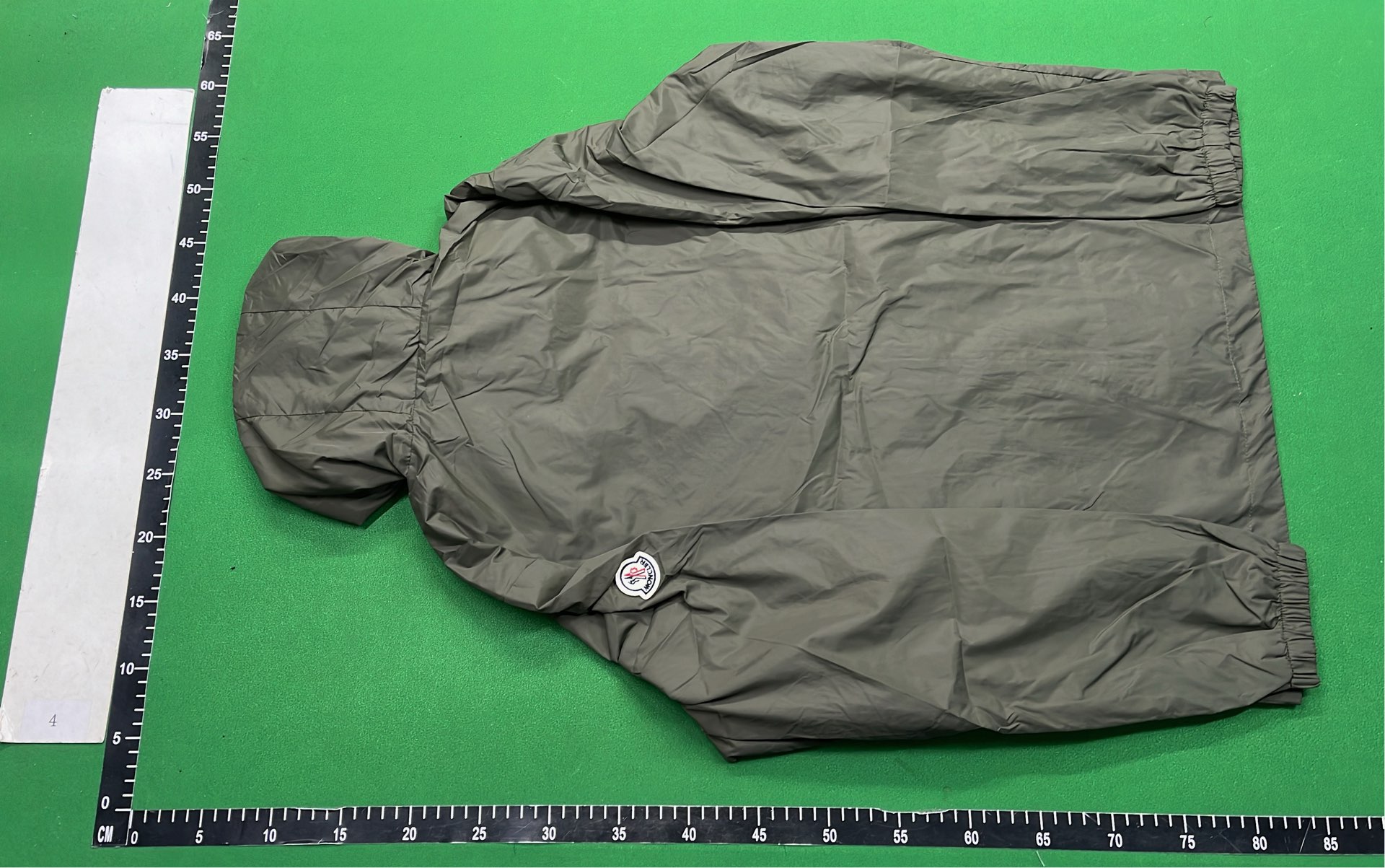 Olive Green Hooded Jacket with Logo Patch and Drawstring Hood