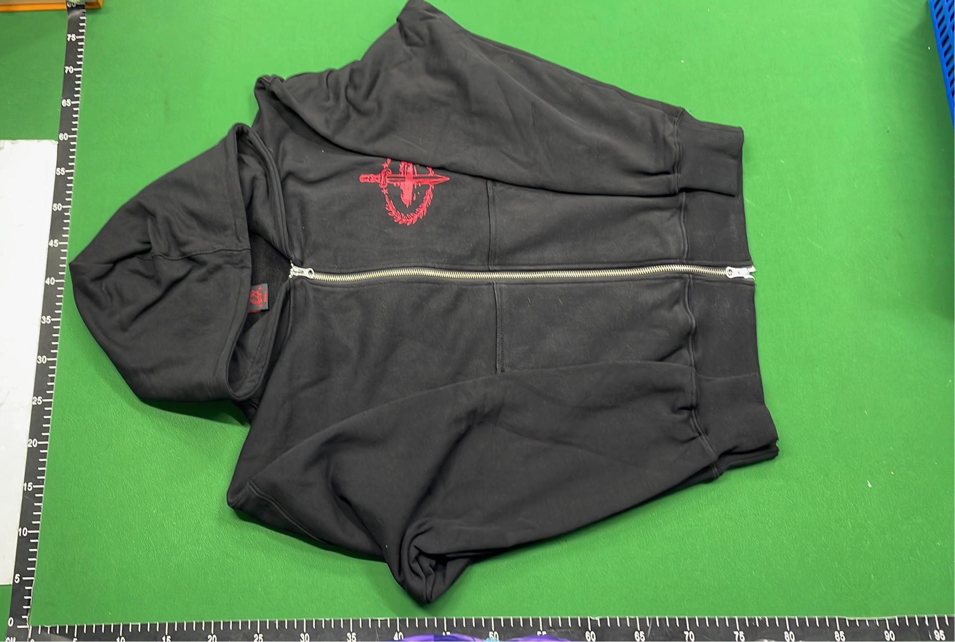 Black Zip-Up Hoodie with Red Abstract Print