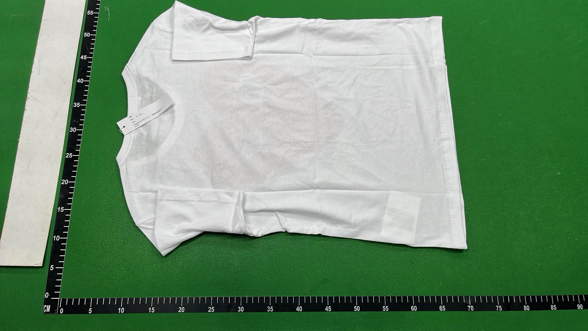 White T-Shirt with Red Heart Eyes Design