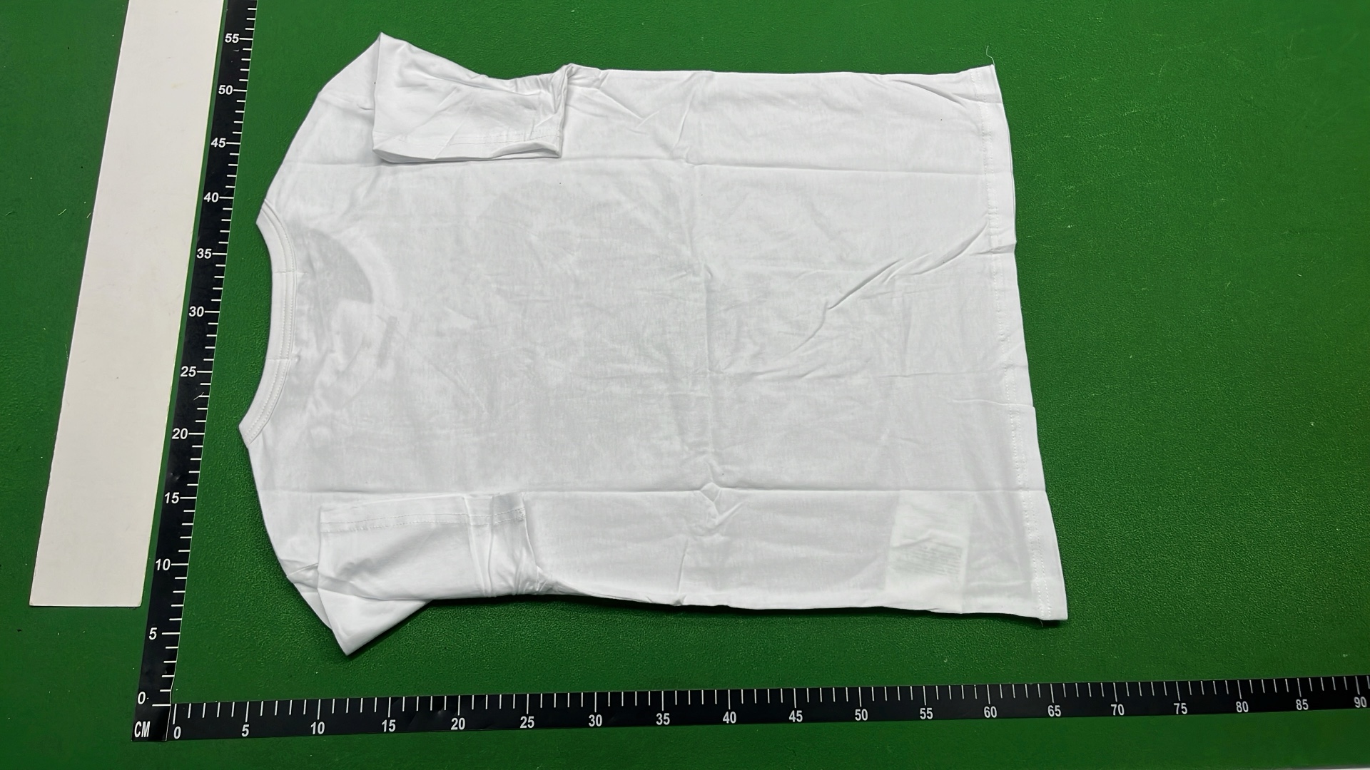 White T-Shirt with Red Heart Eyes Design