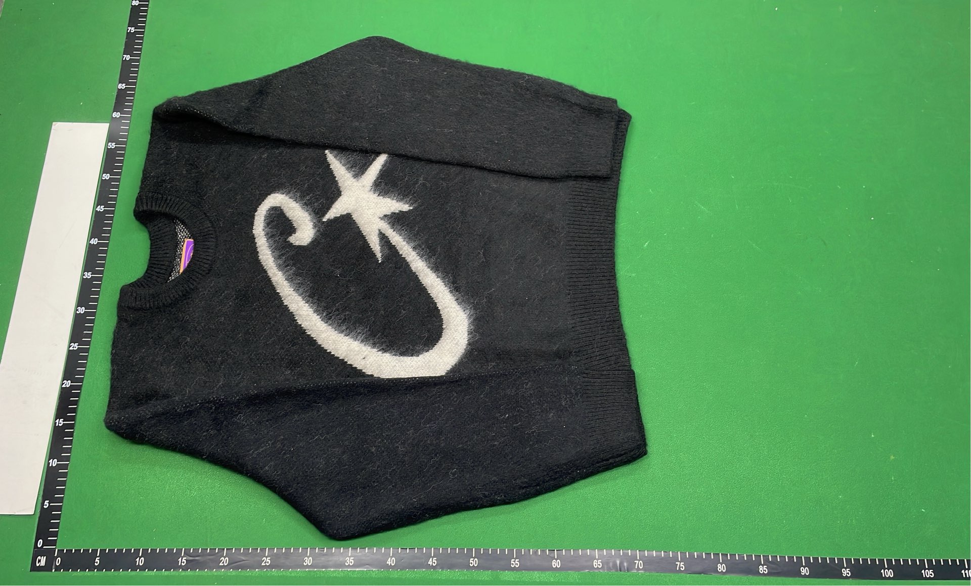 Black CJ Logo Sweater with White Star Design