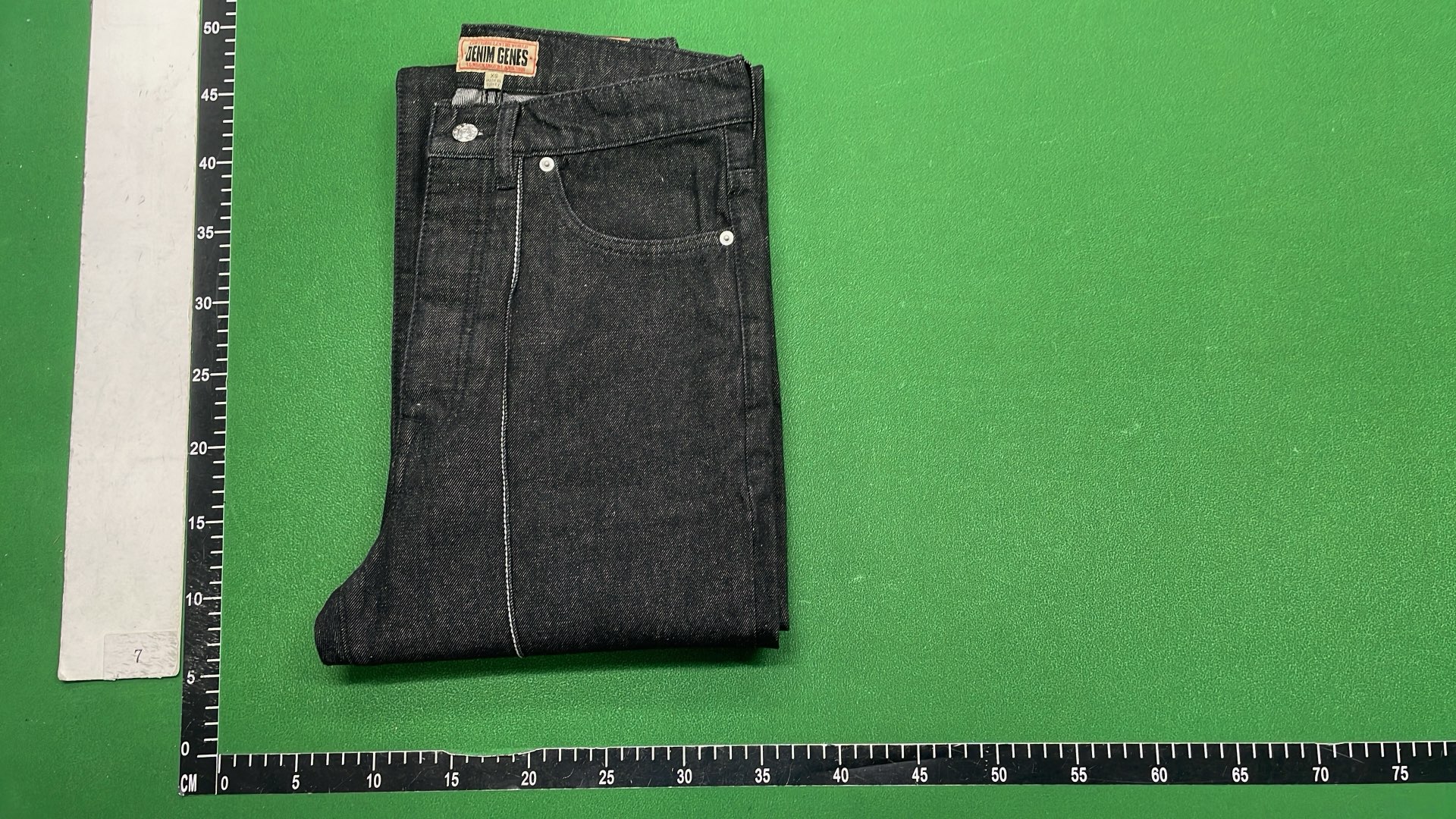 Black Distressed Denim Jeans with Star Patch Design