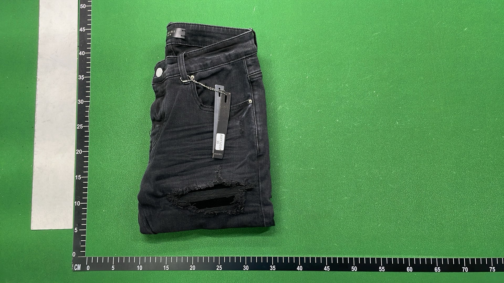 Distressed Black Denim Jeans with Bold Logo Design