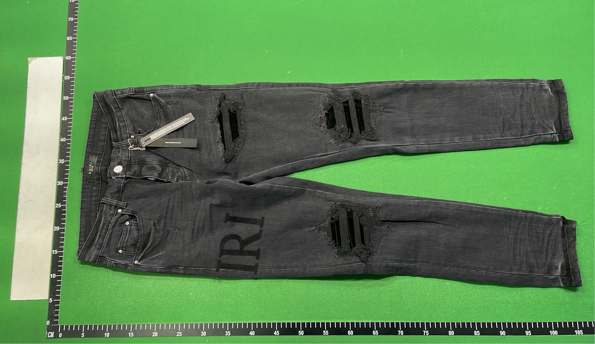 Distressed Black Denim Jeans with Bold Logo Design
