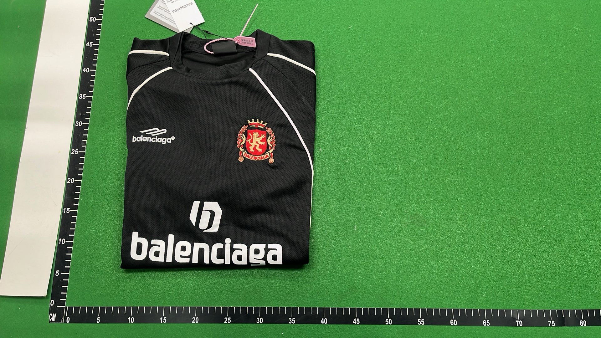 Neon Green Soccer Jersey with Black Accents and Logo